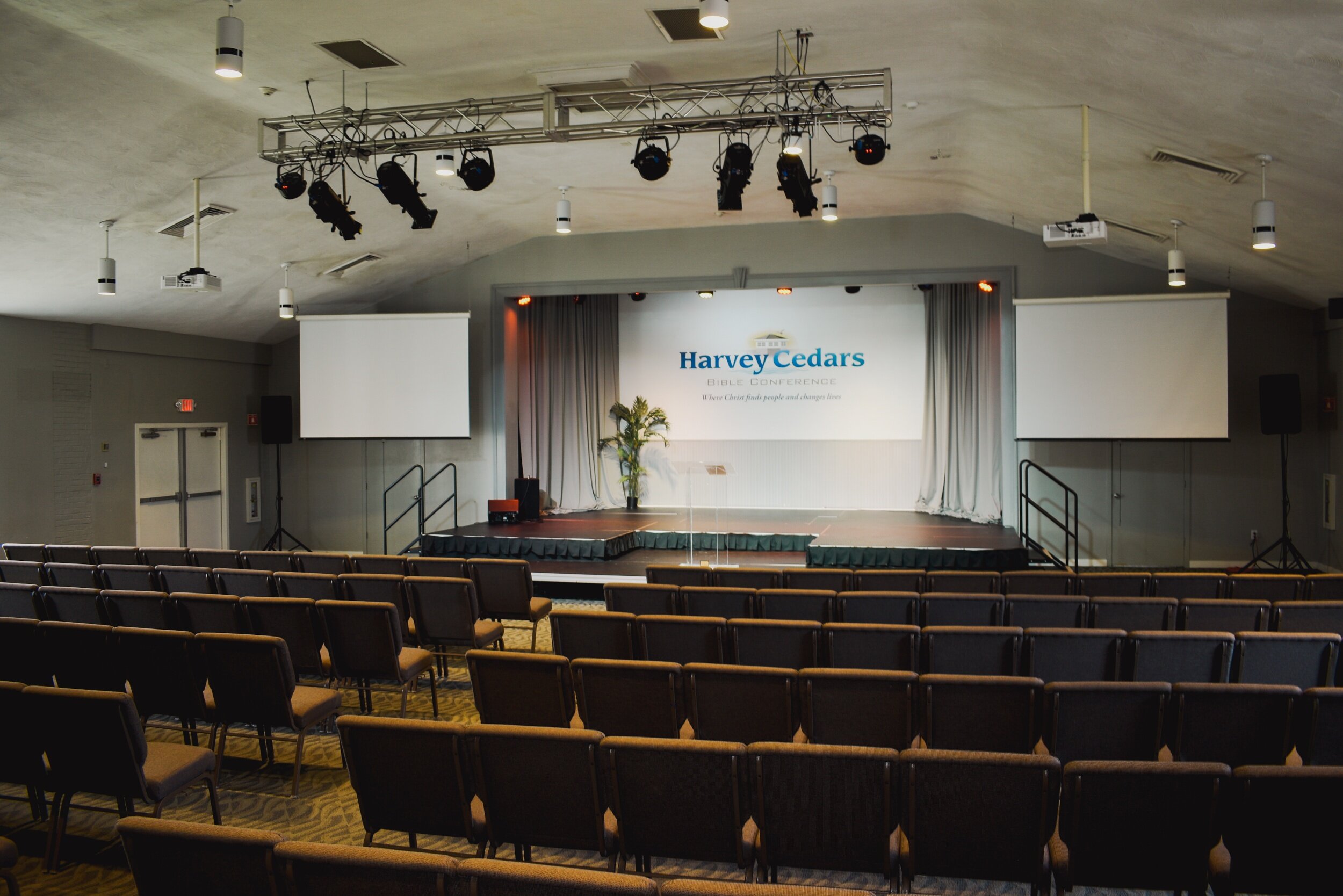 Meeting space with stage and chairs