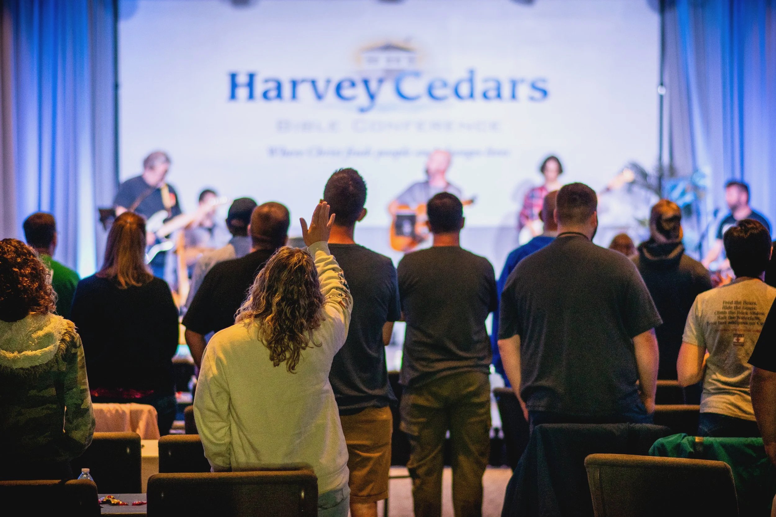 People worshiping on a retreat