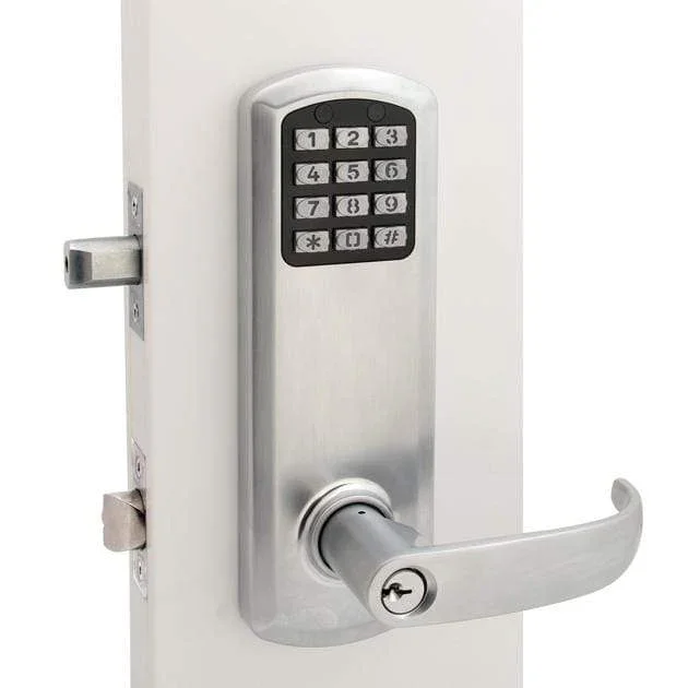 Electronic keypad lock with a lever handle on a white door.