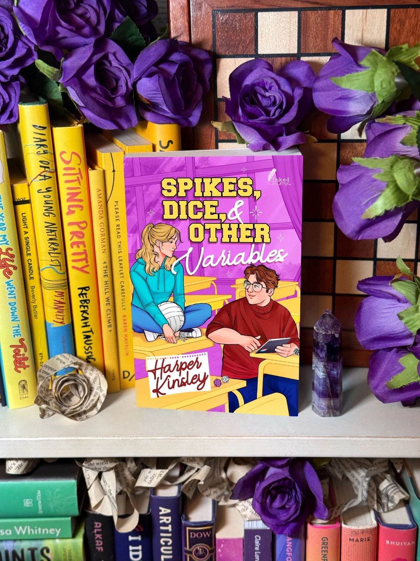 a light purple and yellow book cover with a cartoon illustration of a blonde teen girl with a volleyball sitting on a desk looking at a fat teen boy with glasses and brown hair.