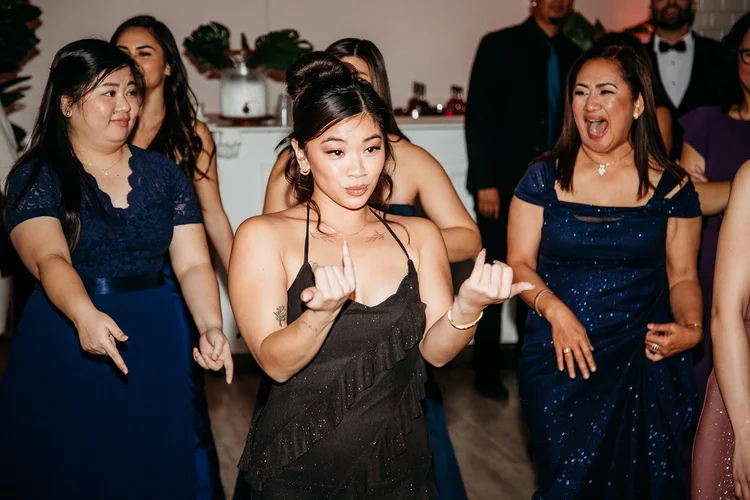 Wedding guests celebrating at Gather Walnut Creek reception