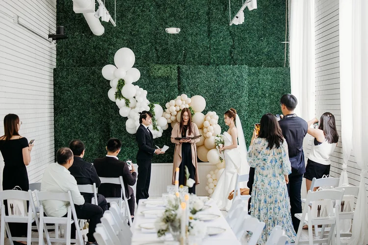 Couple exchanging vows during intimate ceremony at Gather Walnut Creek