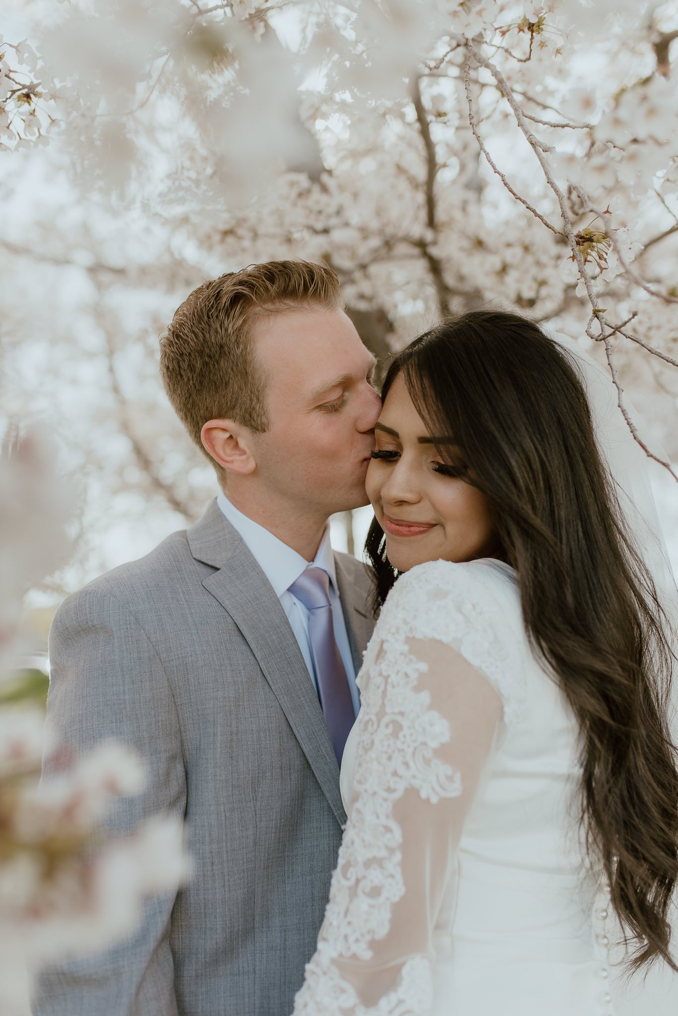  Imagine the perfect fusion of cherry blossoms, the stunning Utah State Capitol, and the sacred Bountiful LDS Temple, all coming together to create the most magical wedding experience. Discover the enchanting beauty of a springtime wedding ceremony s