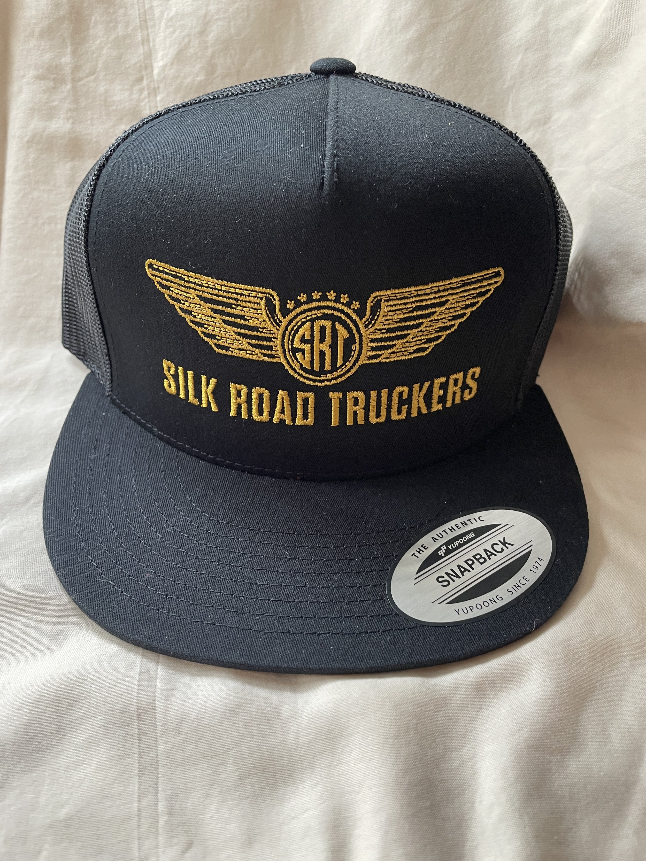 Gold on Black Trucker Hat