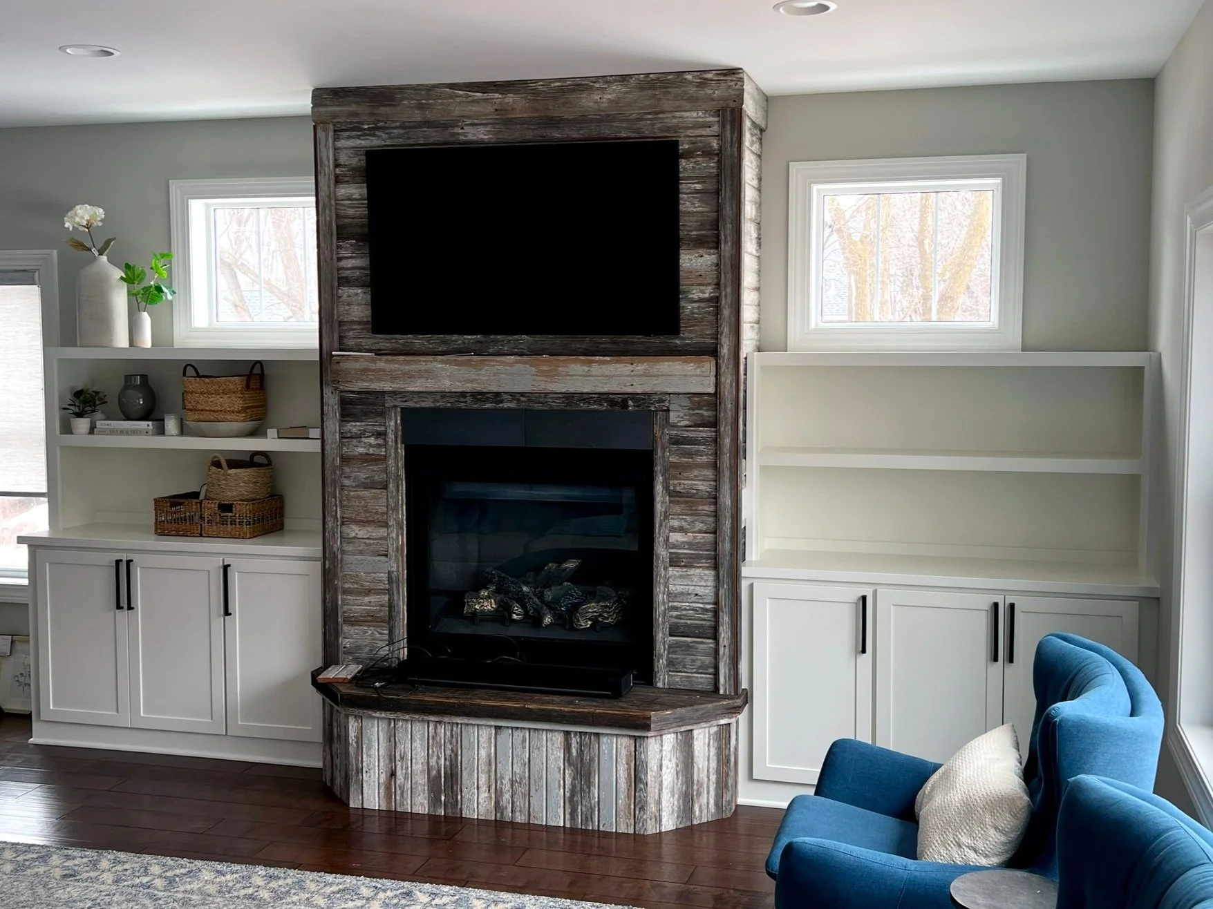 living room fireplace surround cabinets