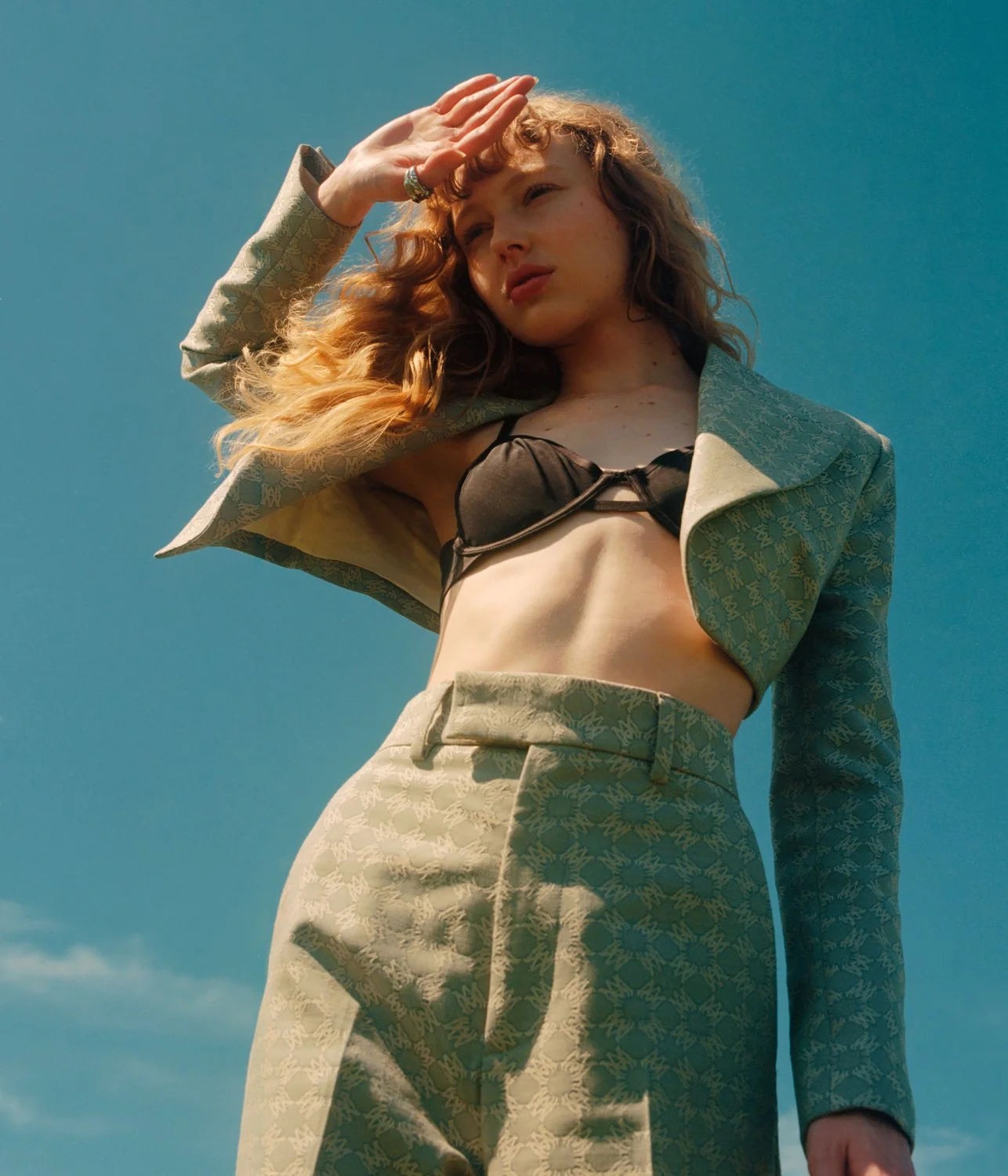 Amiri suit, Olive Club jewelry.