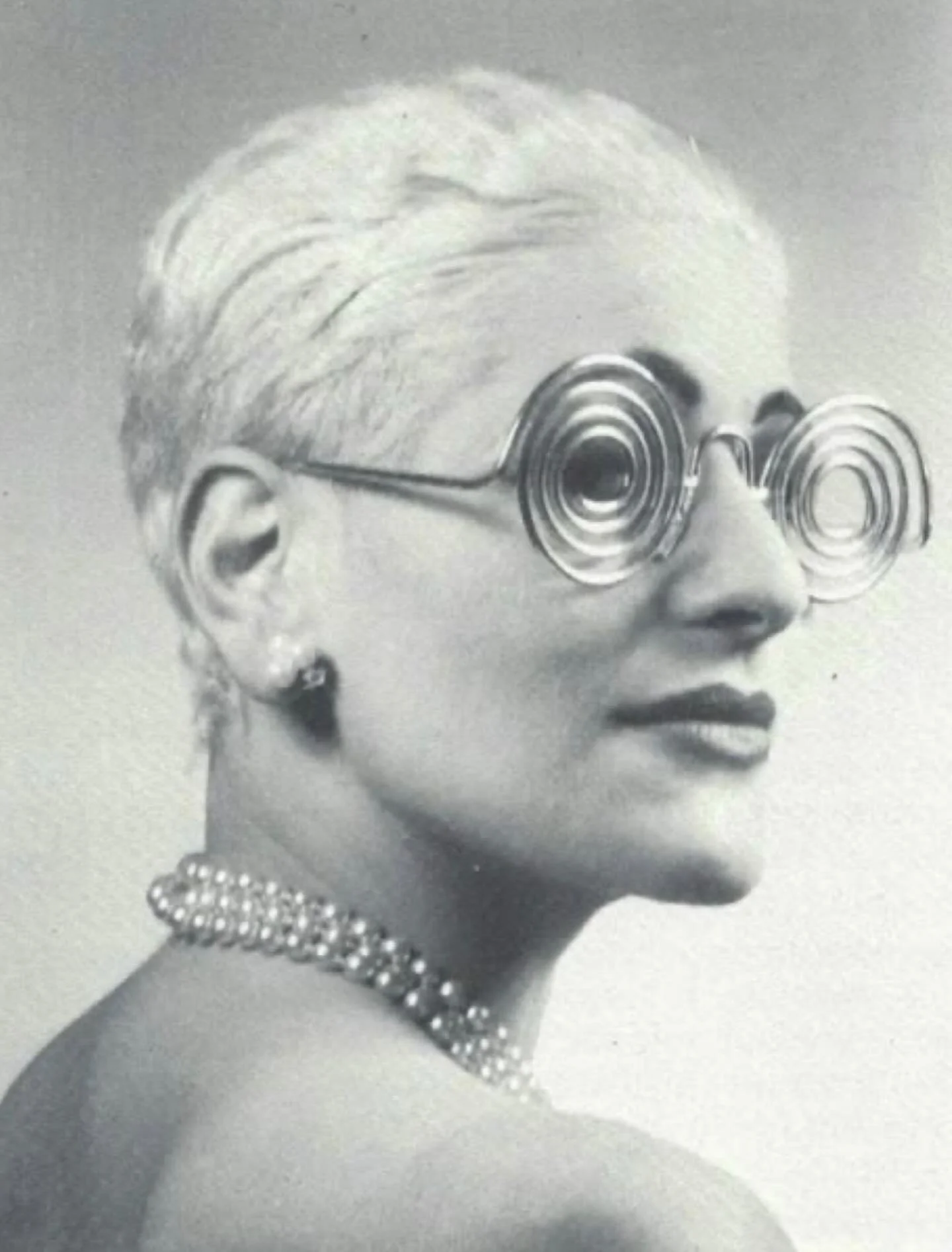 Schiaparelli spiral glasses by Man Ray, 1936.

Man Ray created two pairs of spiral glasses for Elsa Schiaparelli. Veritable surrealist accessories, one of these &ldquo;hypnotic&rdquo; pairs of spectacles was made in metal, the other in twisted shocki