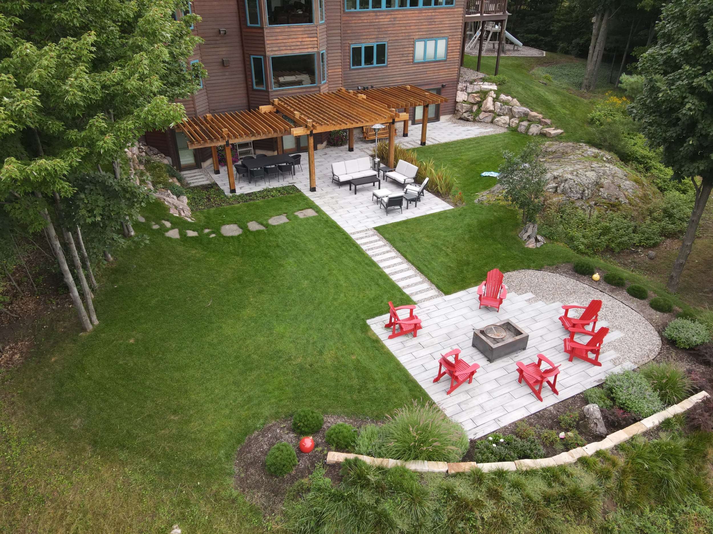 Photo of aerial view of backyard landscape.