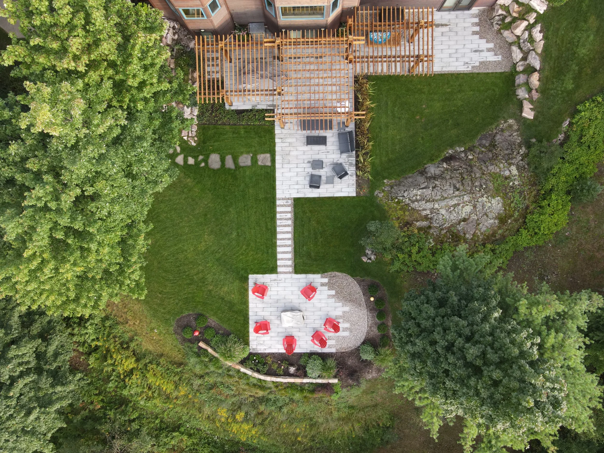 Photo of aerial view of backyard landscape.