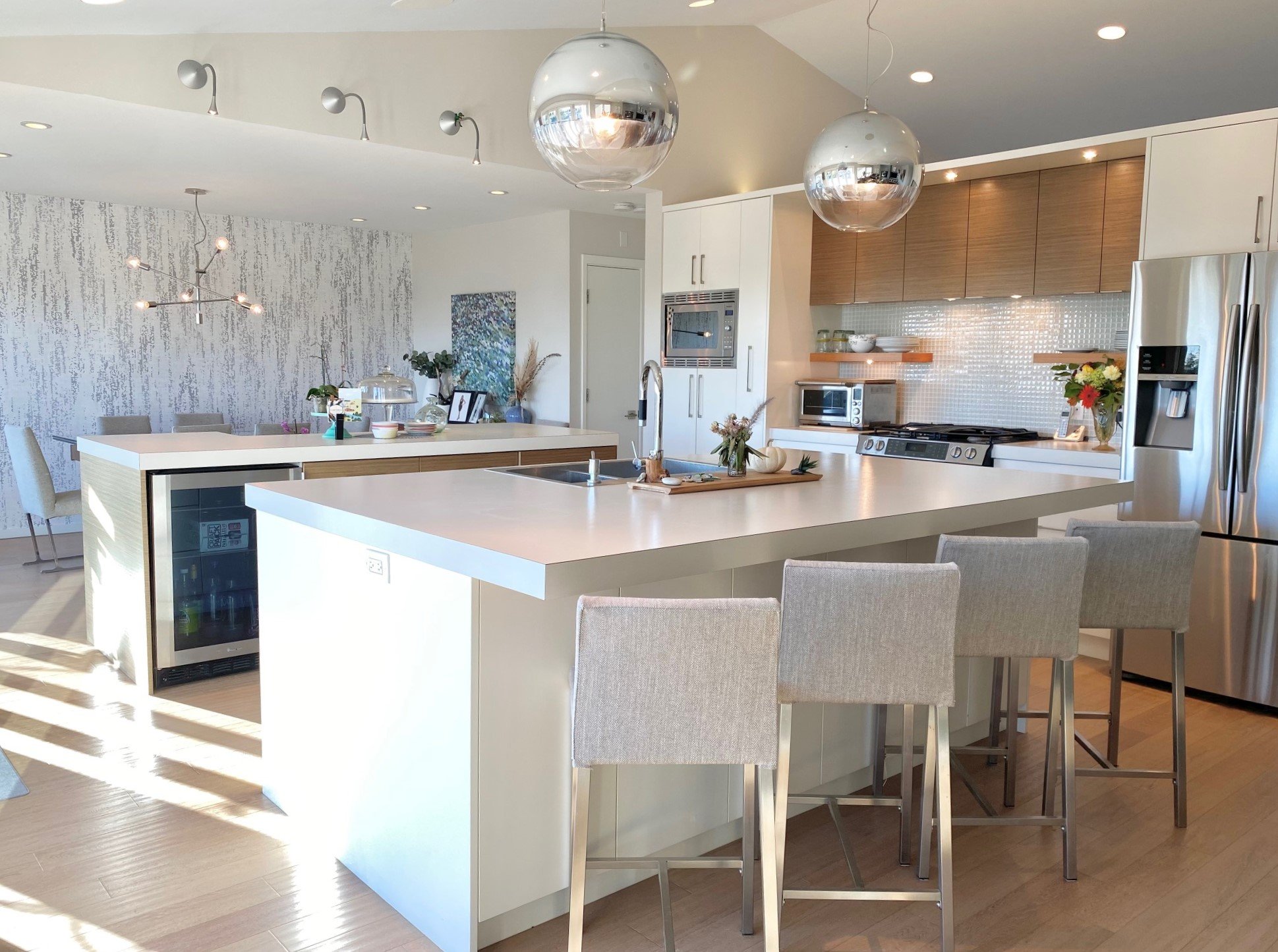 Bright open-concept living, kitchen and dining is what this family was after.