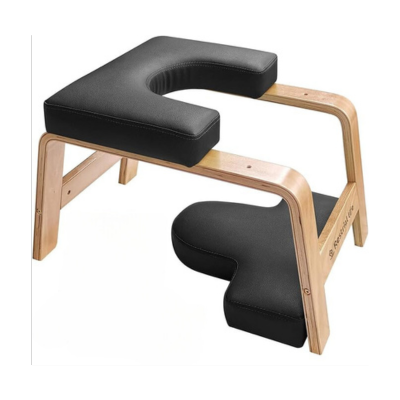 Photo of a yoga headstand bench