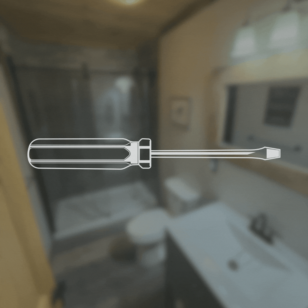 A line drawing of a flathead screwdriver over a blurred bathroom with a sink, toilet, mirror, and shower.