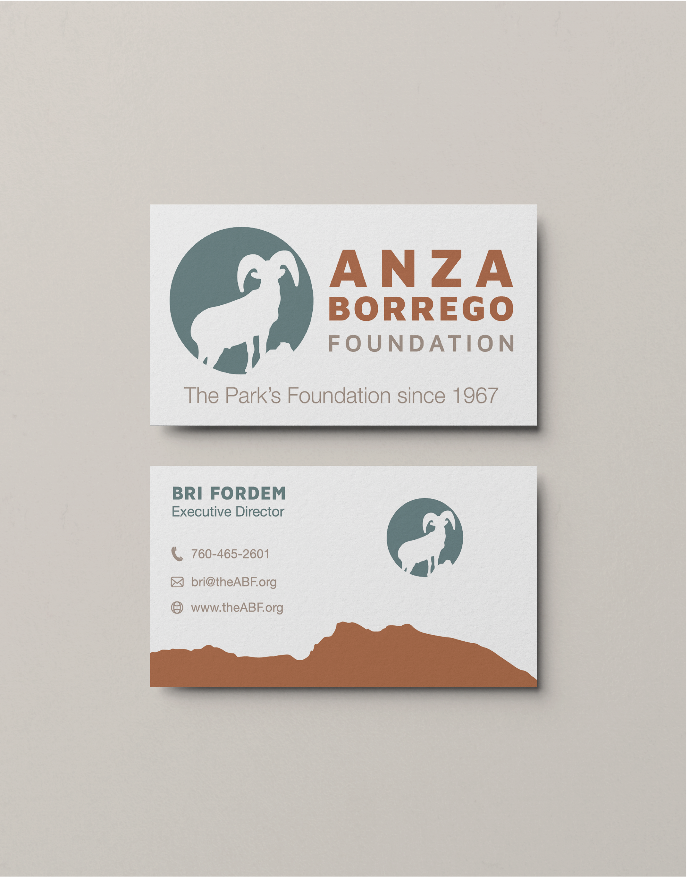 Business card design for ANZA Borrego Foundation with logo of a mountain goat, contact details for Bri Fordem, and the foundation's tagline since 1967.