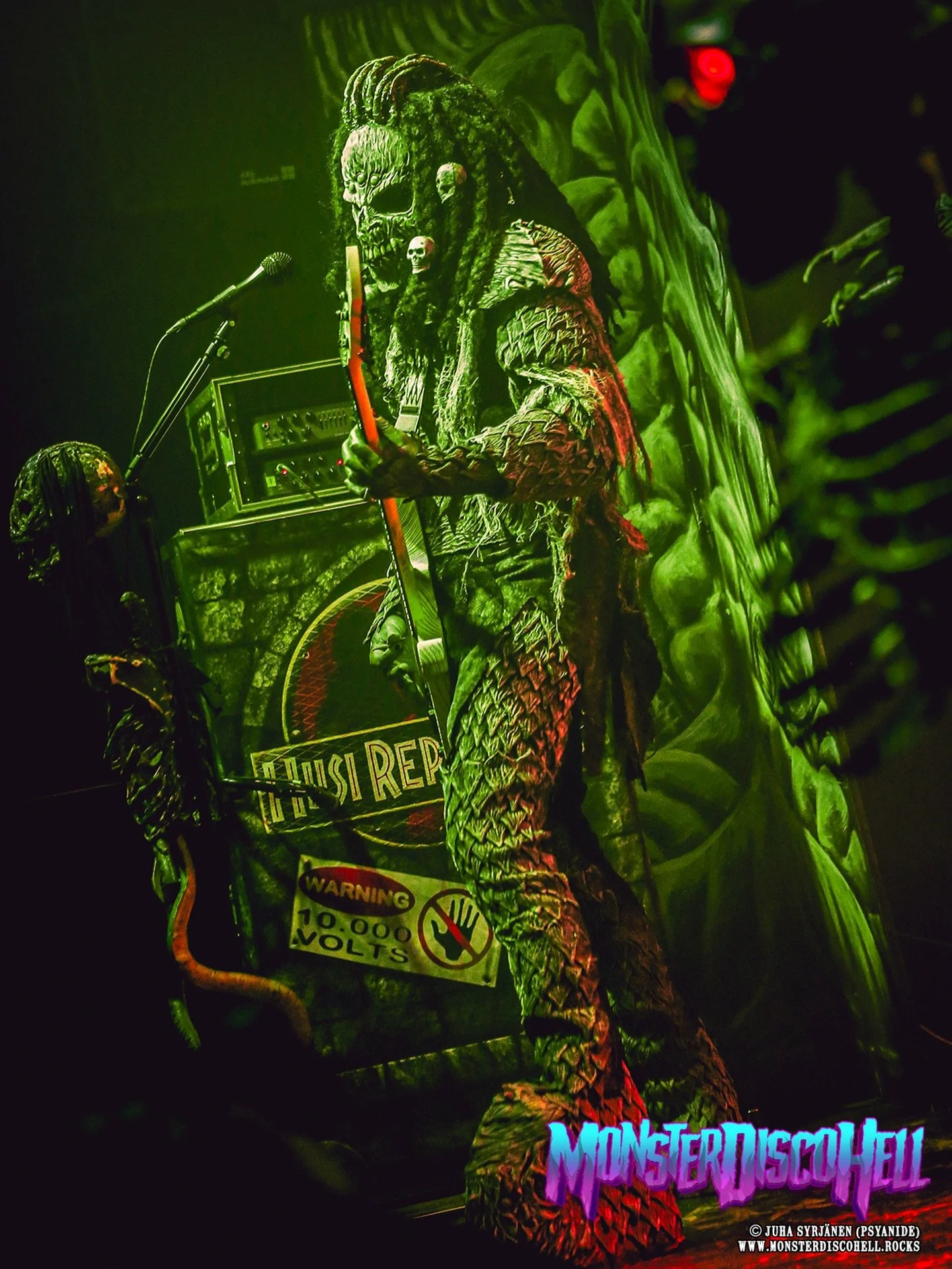 Happy Hiistai, you herd of lizard-lovers! For this week&rsquo;s traditional Hiisi post here on MDH, here&rsquo;s a previously unused shot of the Reptroll and his Jurassic Park themed stage d&eacute;cor I took at Tavastia, Helsinki on March 22nd 2025.