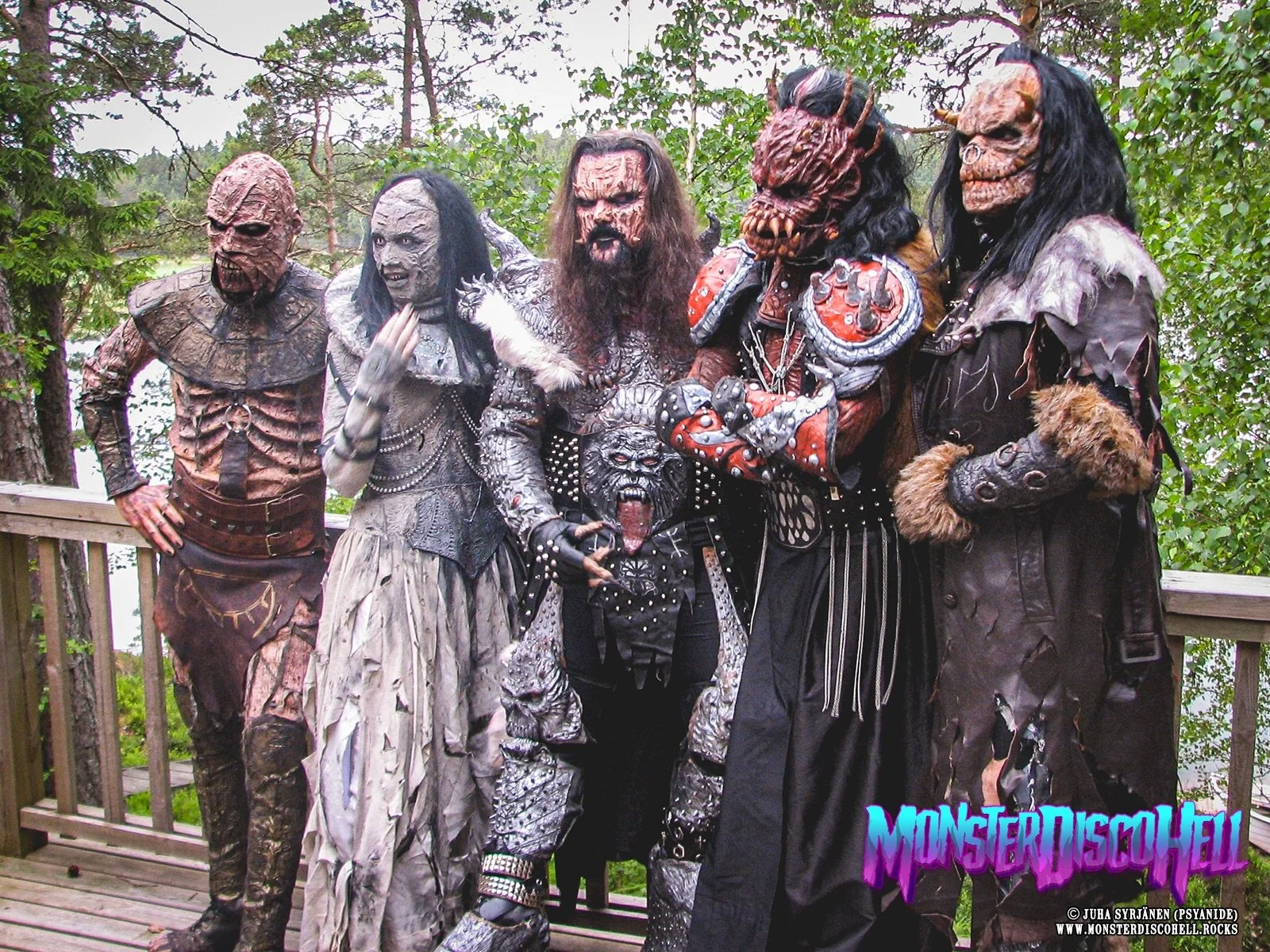 Happy Sunday, monstermaniacs! 20 years ago today, on June 21st 2006, Lordi performed at a private event in Tammisaari, Finland to kick off their Midsummer mini tour! Here&rsquo;s a sweet group shot from that day just before the show, of the classic T