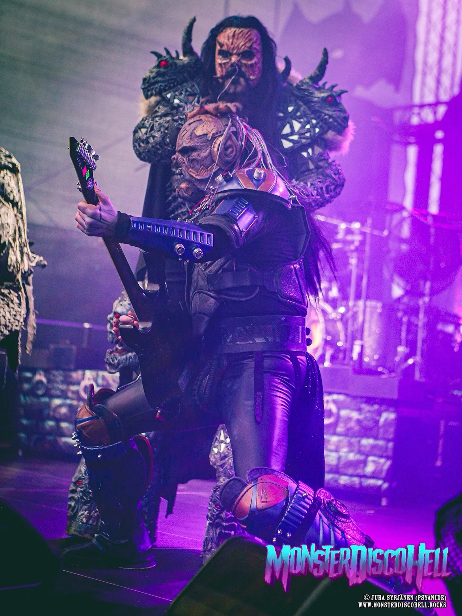 Good things come in short packages. It&rsquo;s time for our mid-week Kone stuff. Help me out! What is happening here? Is Mr. Lordi giving the good boy a pat on his head, or helping him to keep his head from floating? This shot was taken at Logomo, Tu