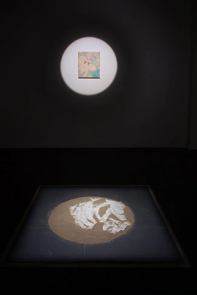 Installation view. The white silicone rubber takes the same shape as the turquoise form in the lower-right of the drawing on the wall.
