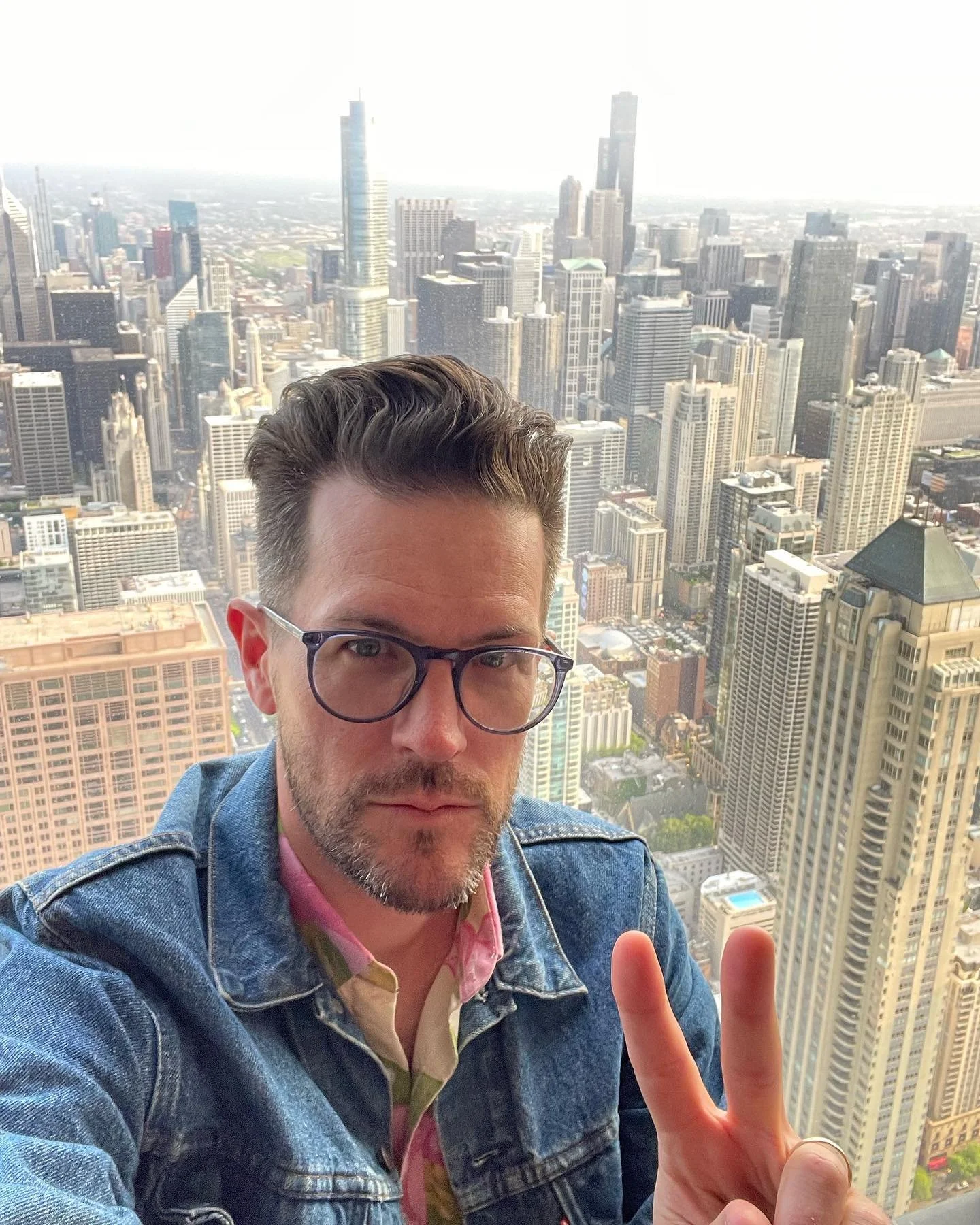 #todaysDJbooth is all the way up at The Signature Room on the 95th floor of the Hancock building. Chicago looking picture perfect despite the haze.