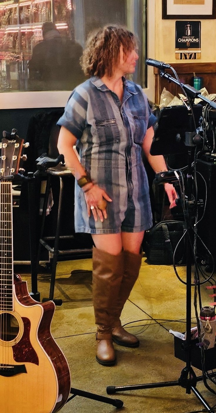 Maggie Singing DM 1:2025.jpg