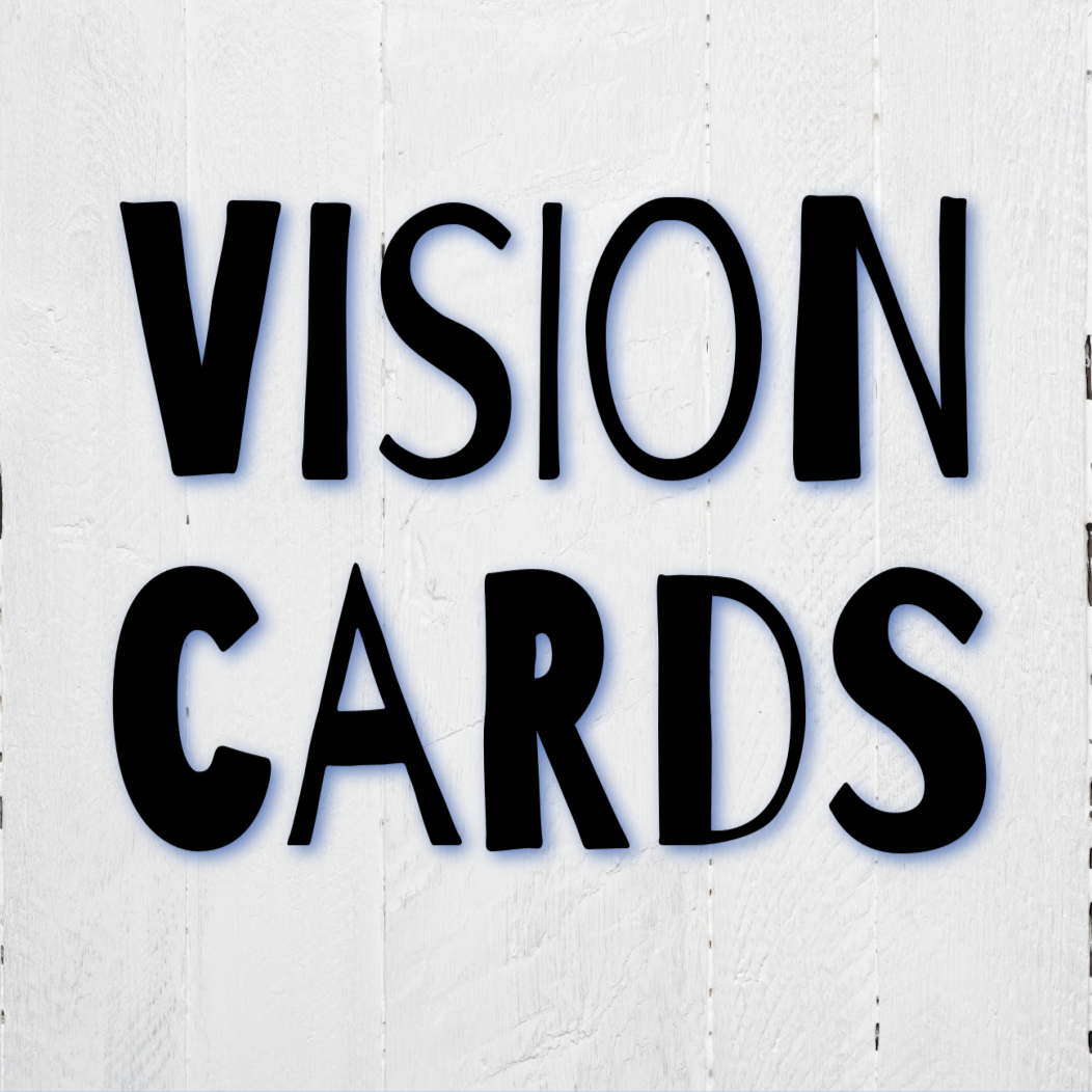 "Vision Cards" text in black on white wood background