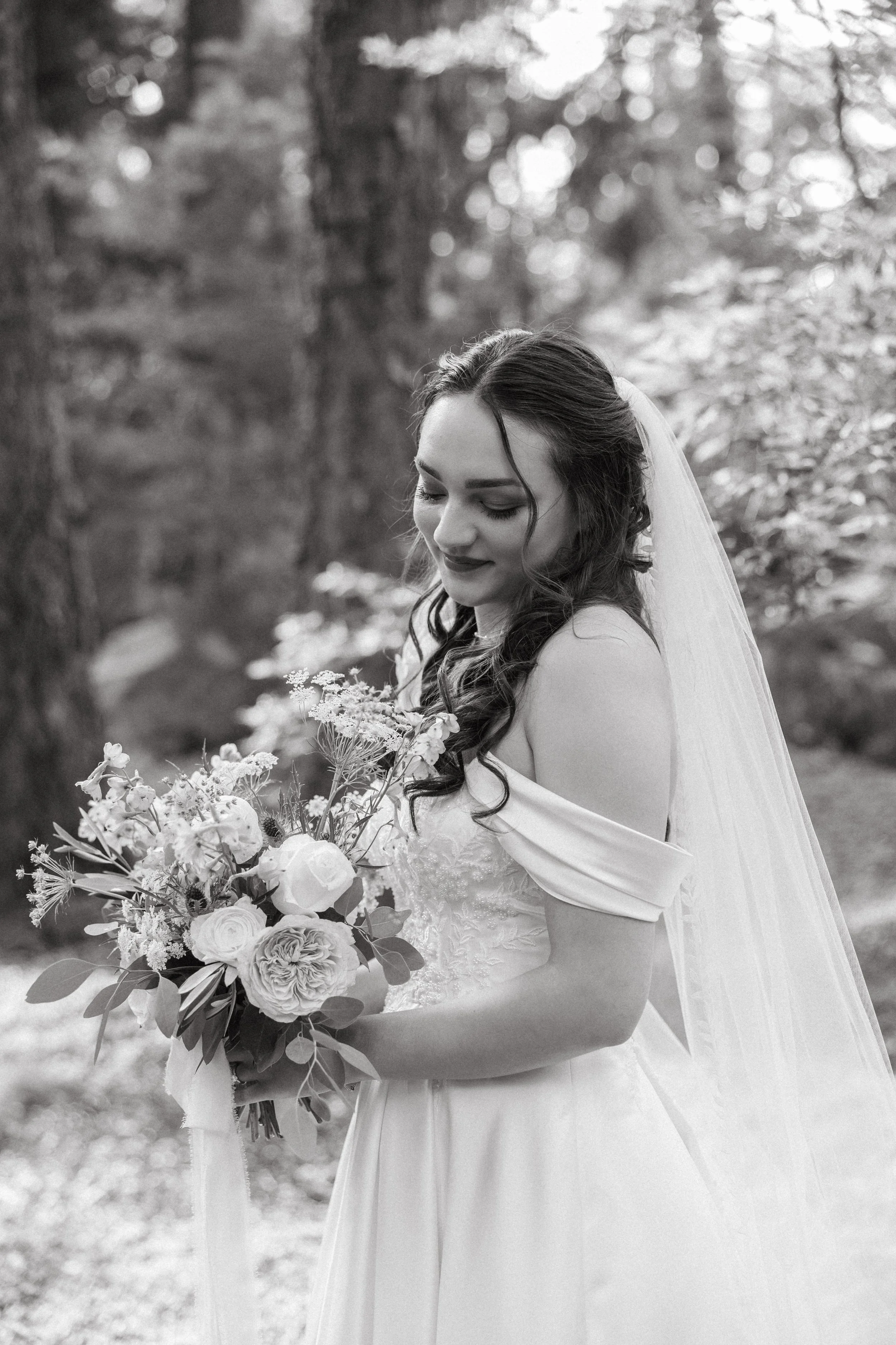 bride looking at her boquet in Nevada City CA
