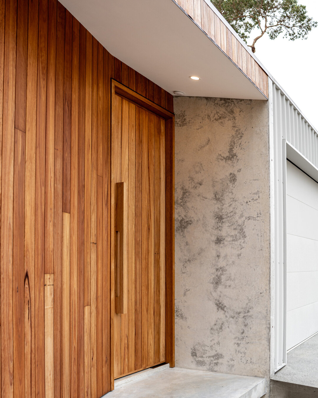 Tallwood Project - Blackbutt timber, concrete &amp; shale grey matt Colorbond cladding with bespoke front door to fit seamlessly into the @mortlocktimber cladding. ​​​​​​​​
​​​​​​​​
#blackpointconstruction #margaretriver #builder #house #home #design