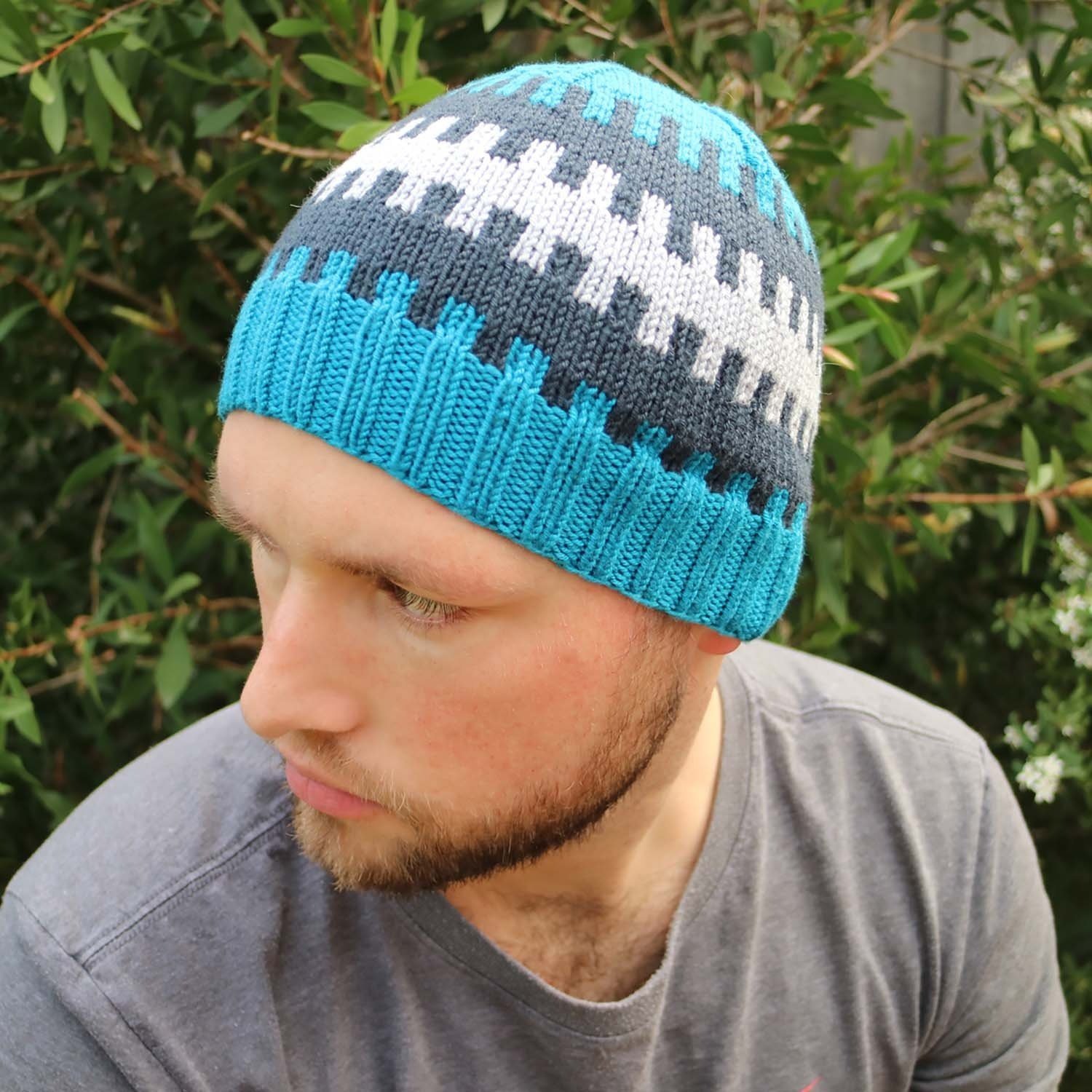 Cogs knit beanie in pale blue, aqua and silver