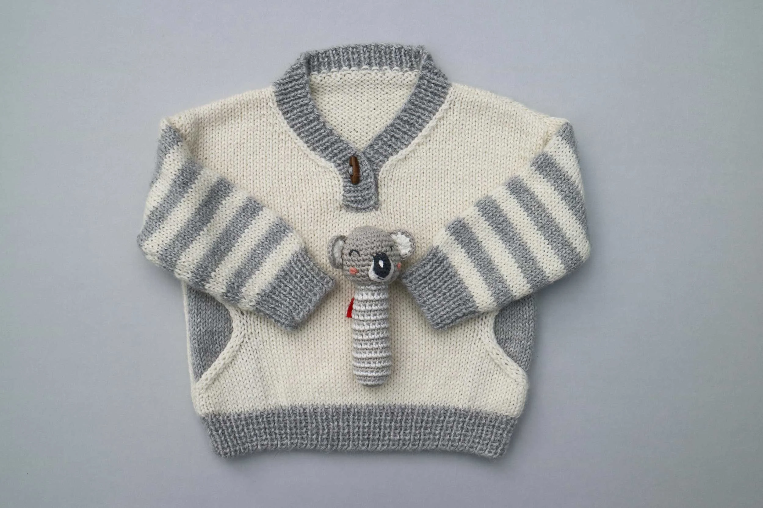 linden-baby-handknit-pockets-stripe-sleeves-gift-knit.jpg