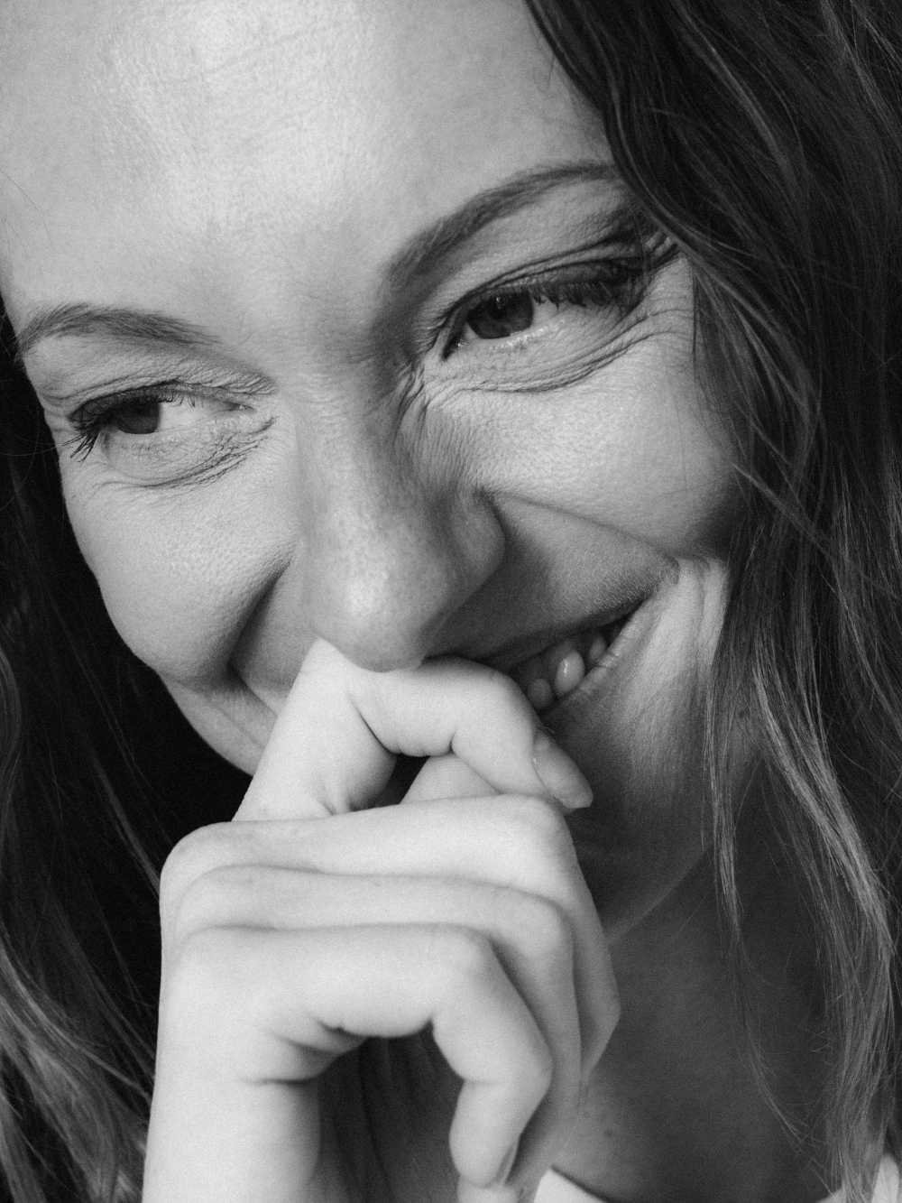 woman smiling with her self care resources