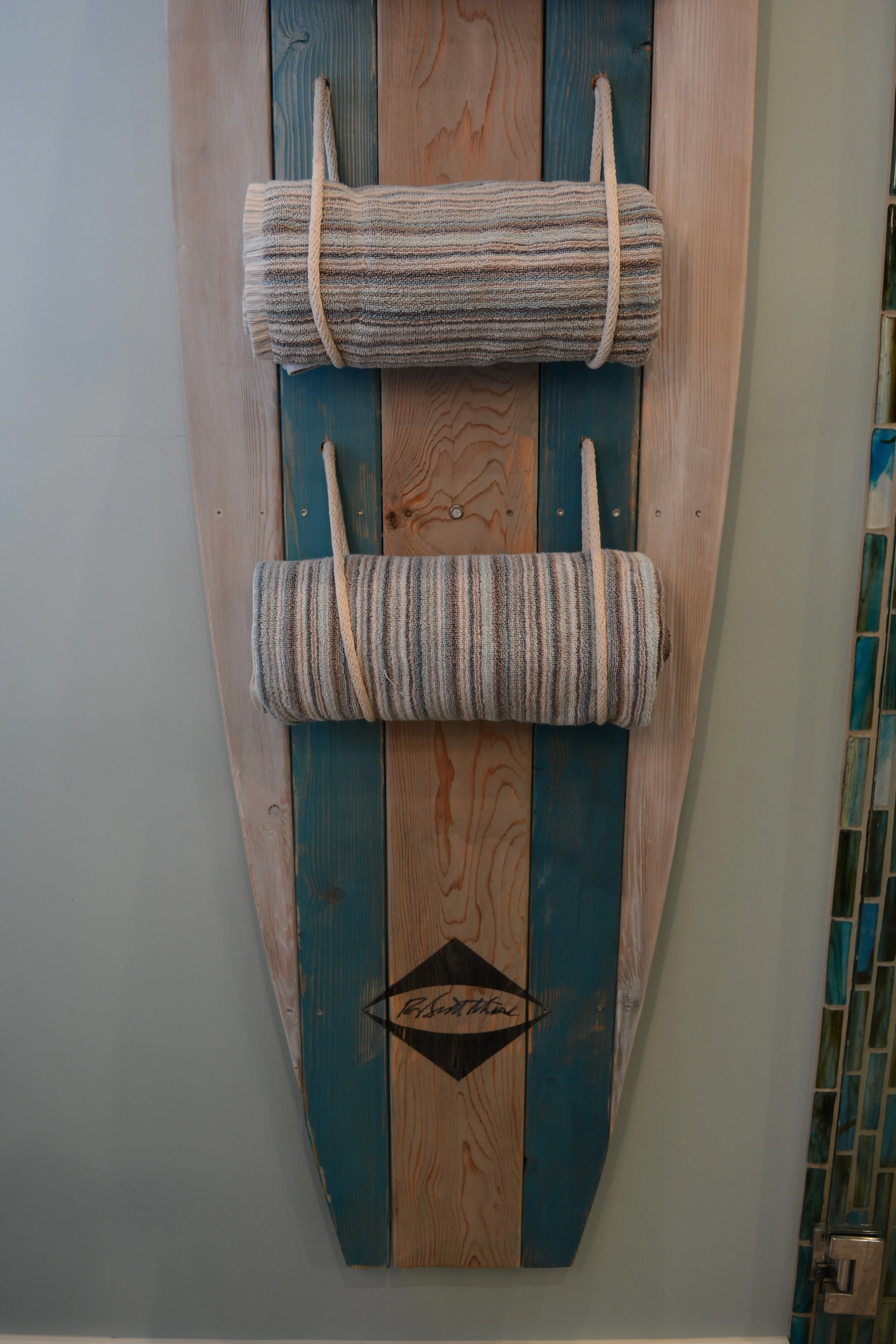 Surfboard towel rack closeup.JPG