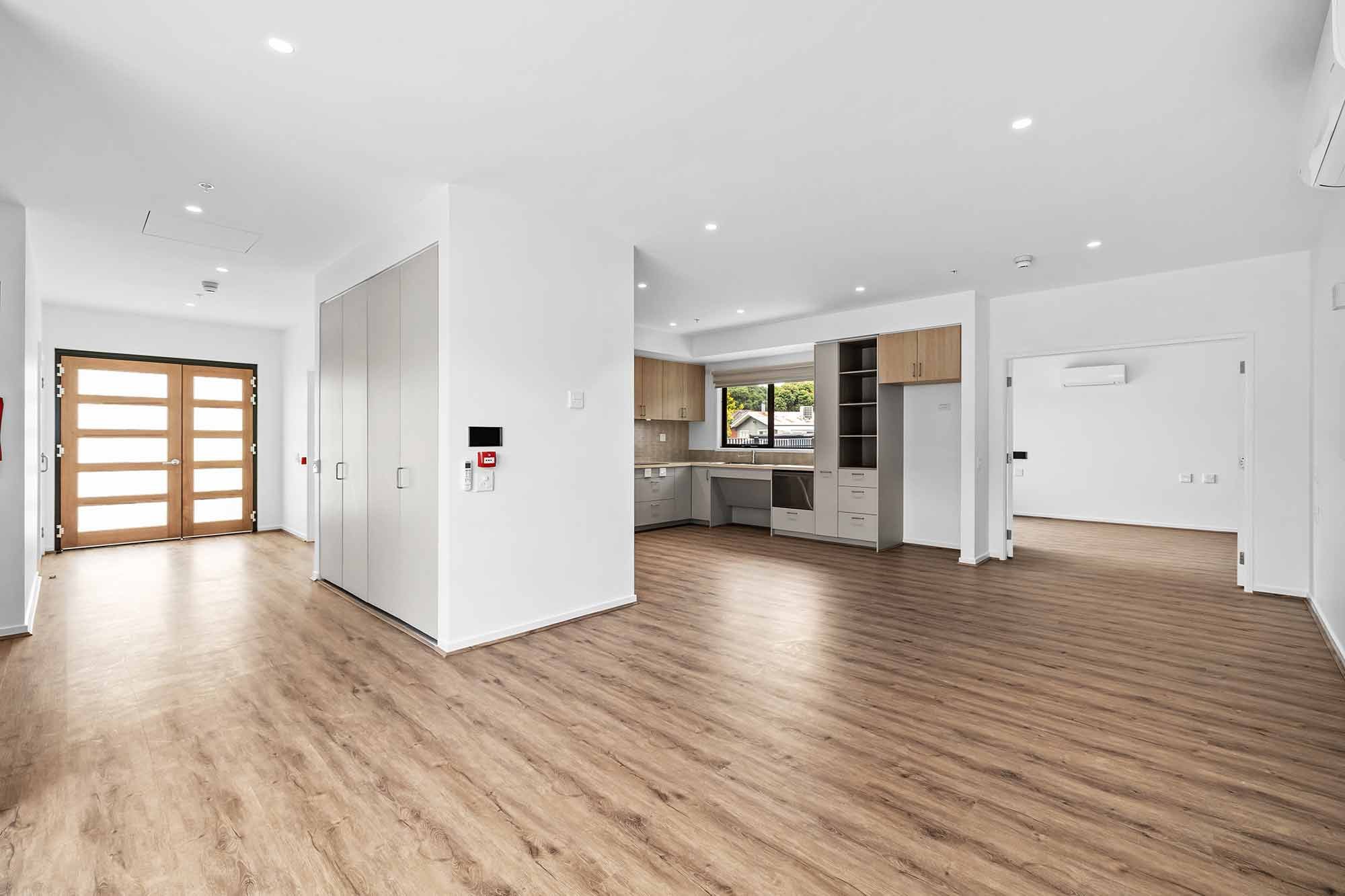 The open plan kitchen and living room at the at the Balmain and Co Rosebud SDA
