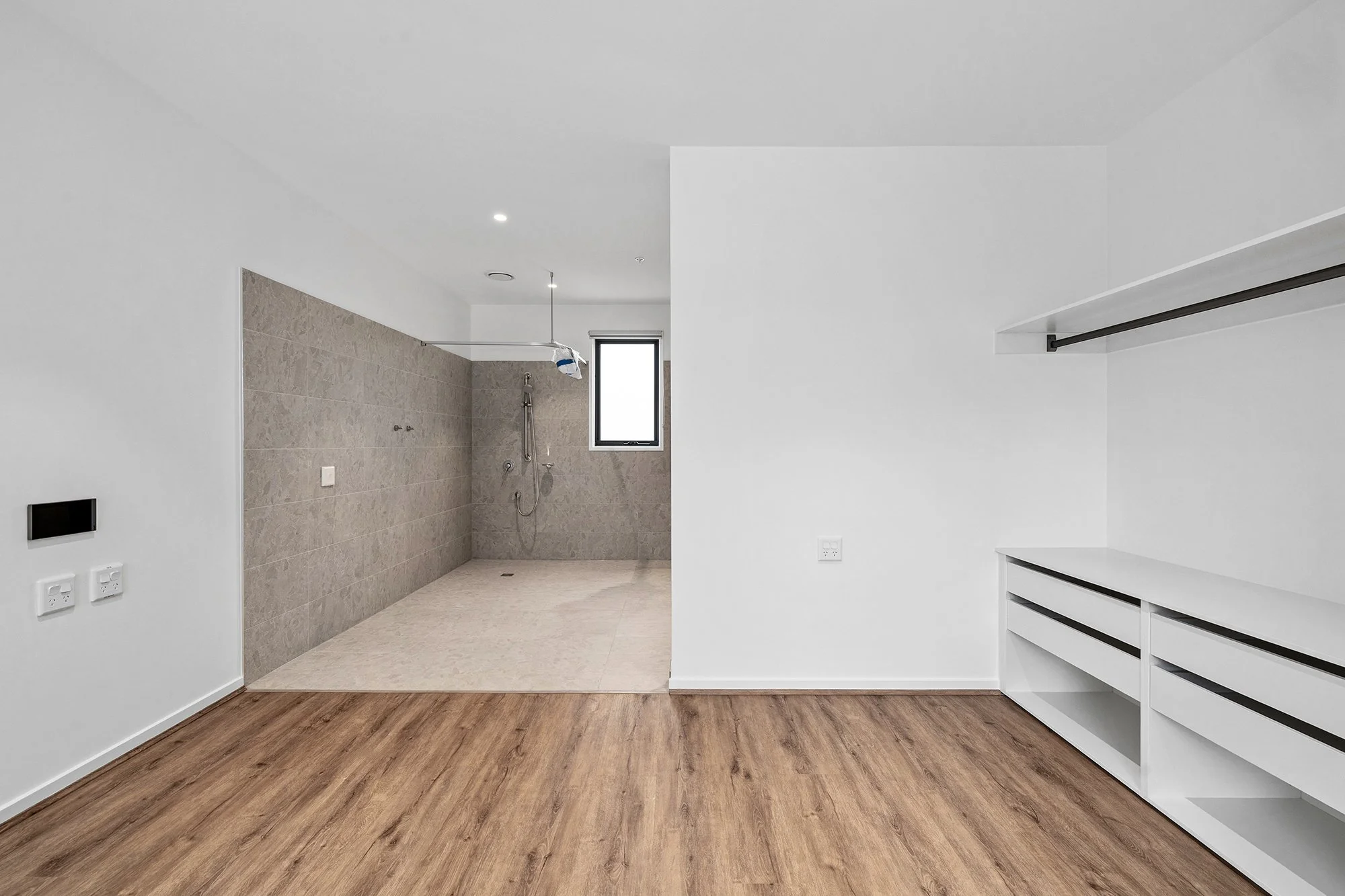 The accessible bedroom and ensuite bathroom at the Balmain and Co. Rosebud SDA 