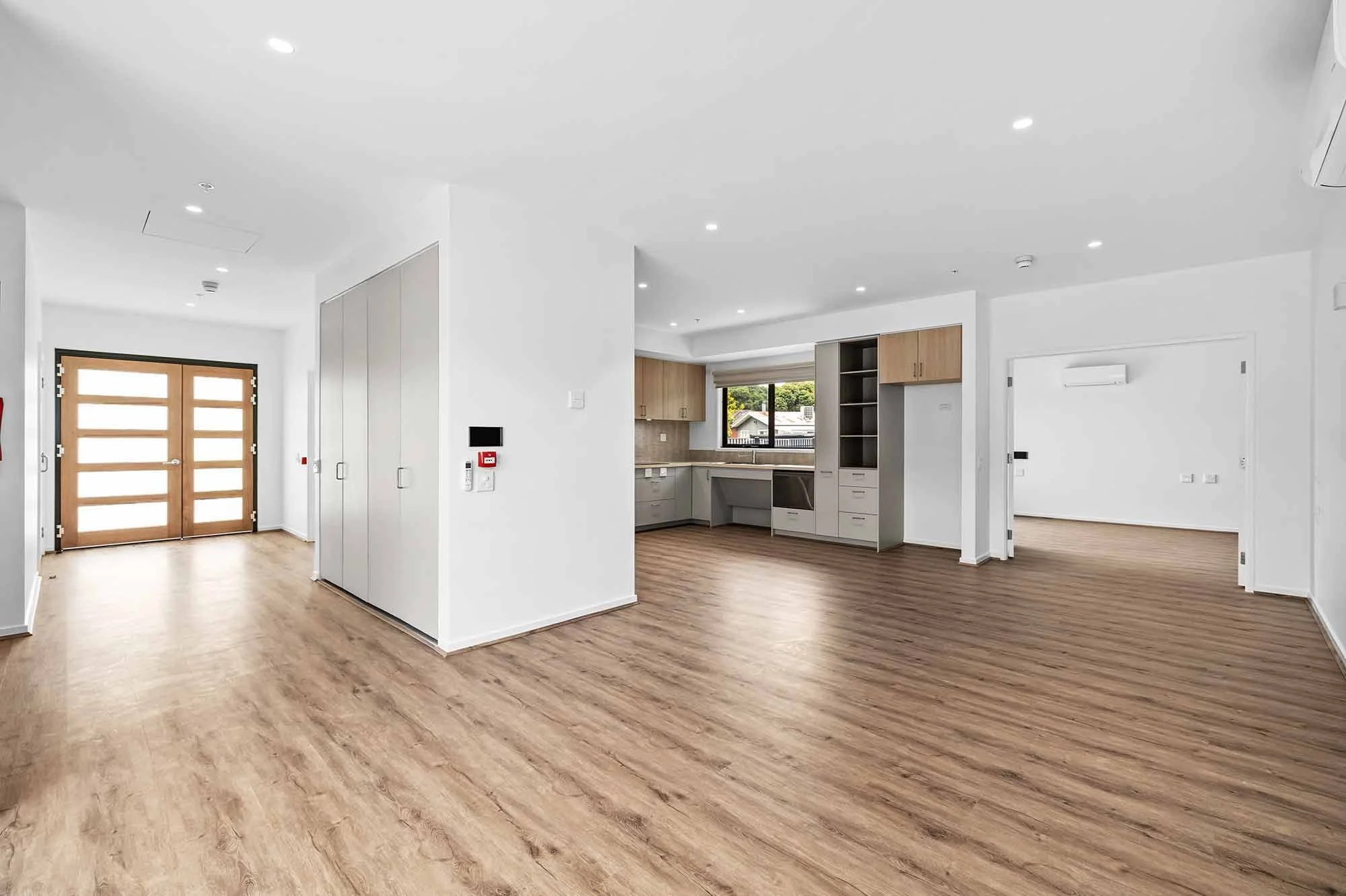The open plan kitchen and living room at the at the Balmain and Co Rosebud SDA