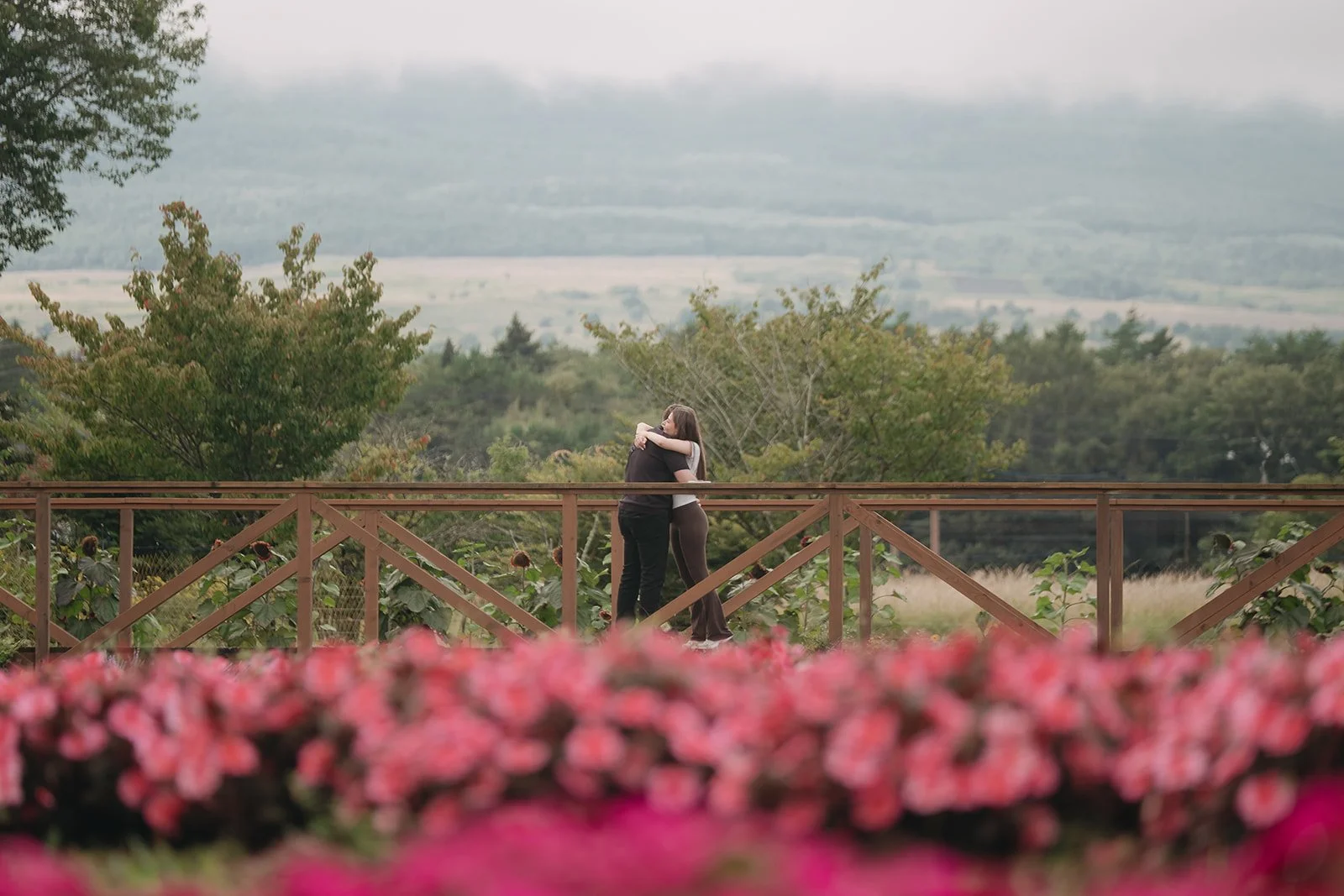 couple celebrating engagement with Mt Fuji views in Japan