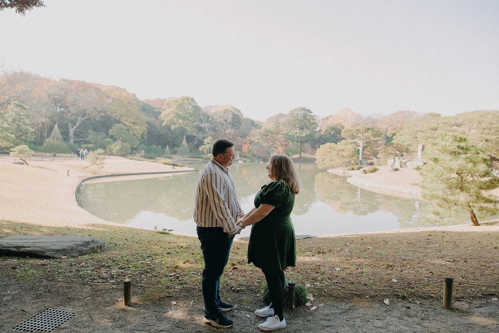 Engaged couple autumn garden Rikugien Tokyo Japan November