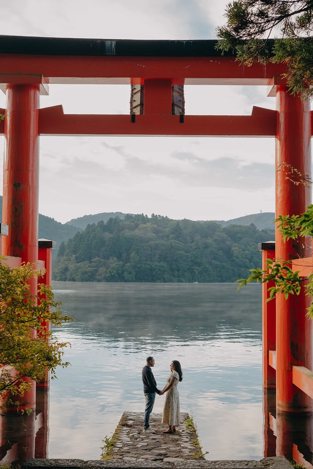 Charandeep proposing to Simran at the torii gate in Hakone, Japan