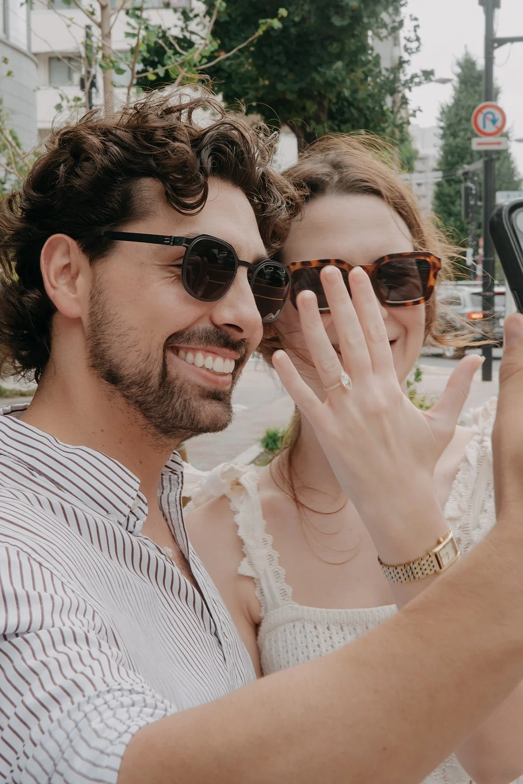 couple celebrating after surprise engagement in Tokyo Japan