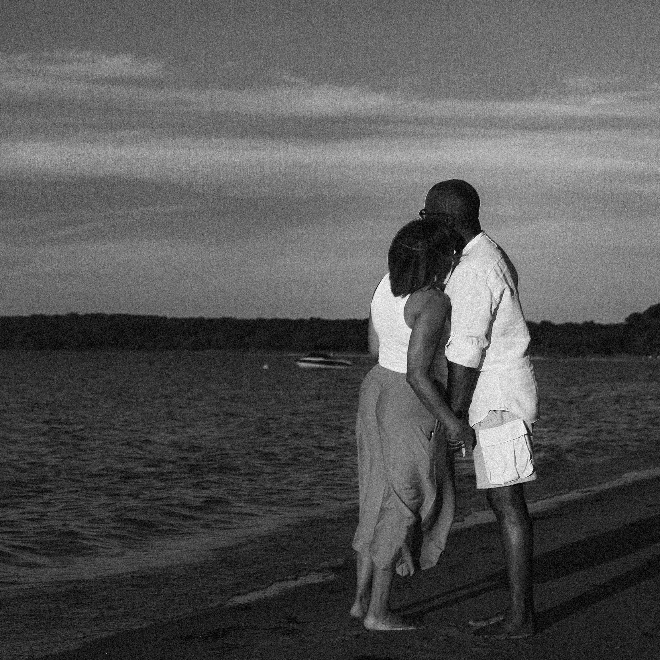 Pampas Picnics | Henry and Deborah standing along the Azurest Beach shoreline after becoming engaged