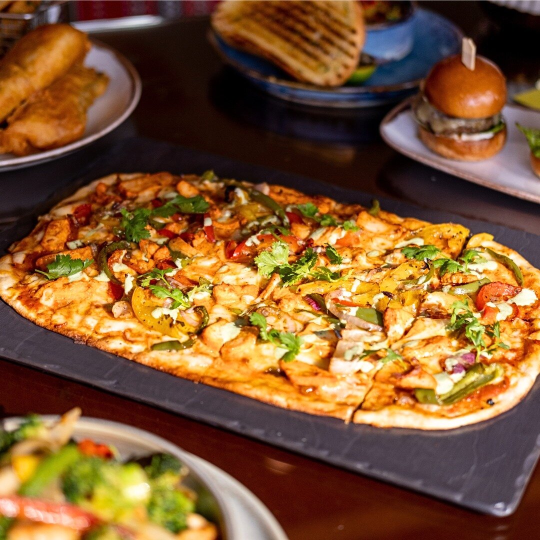 In celebration of the 10th anniversary of Dubai Food Festival, we&rsquo;re launching a special AED 10 dish! Tuck into a scrumptious Chicken Tandoori Flatbread, topped with tomato sauce, mozzarella, roasted bell peppers, red onion and mint chutney and