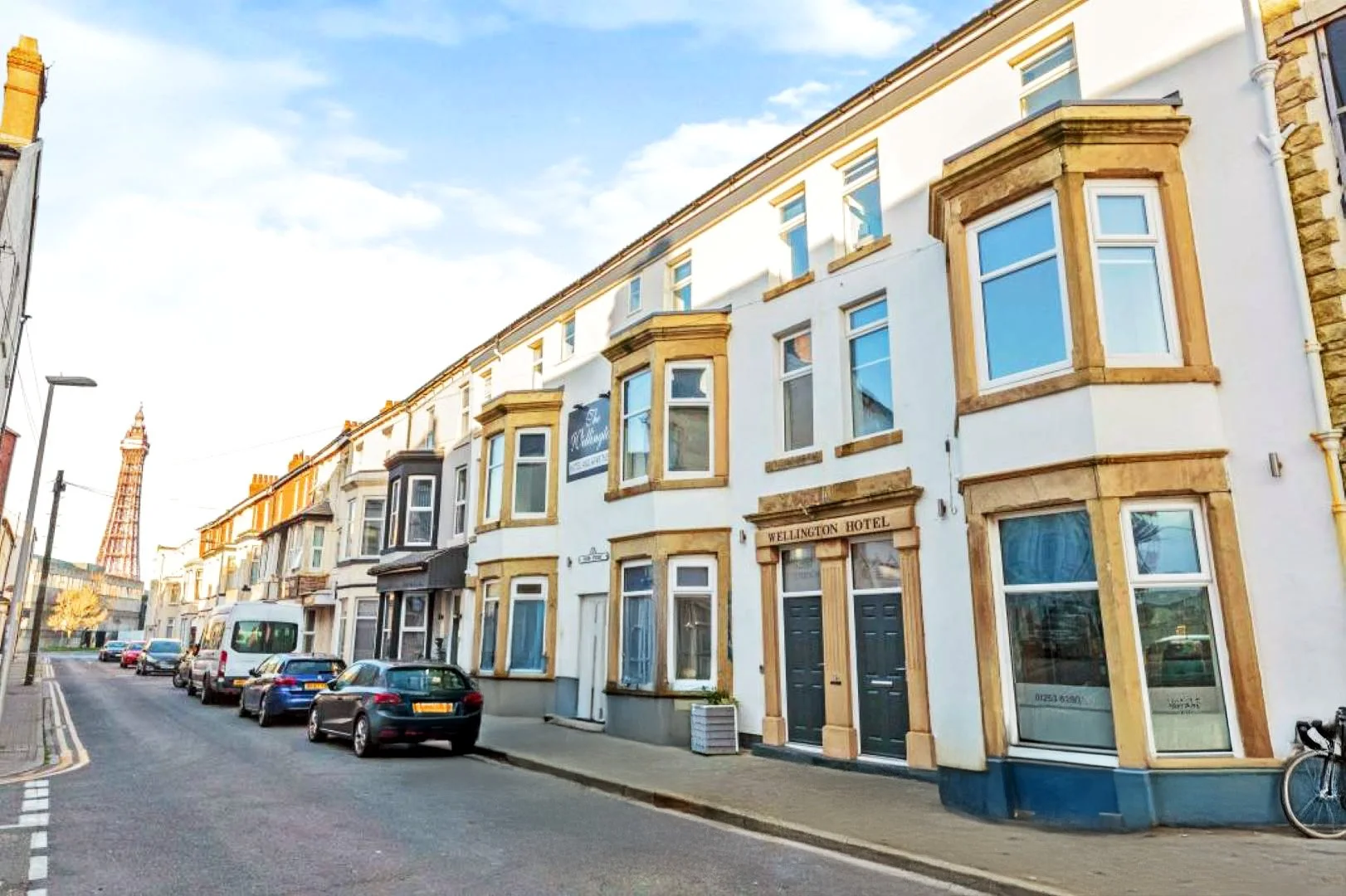 Modern apartment kitchen with white units