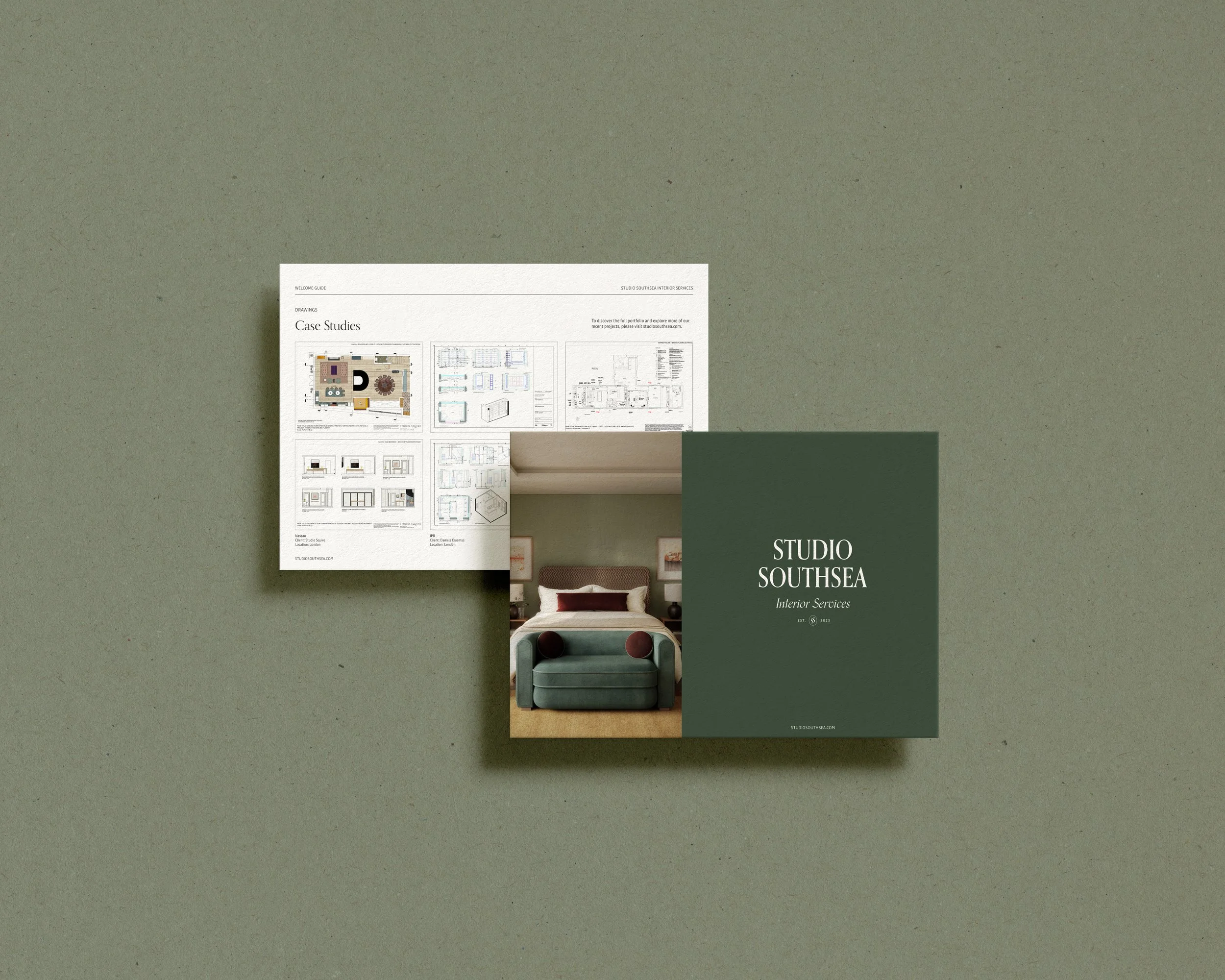 Open interior design brochure for Studio Southsea on a green textured surface, showing a bedroom photo on the cover and a page with case studies and floor plans inside.