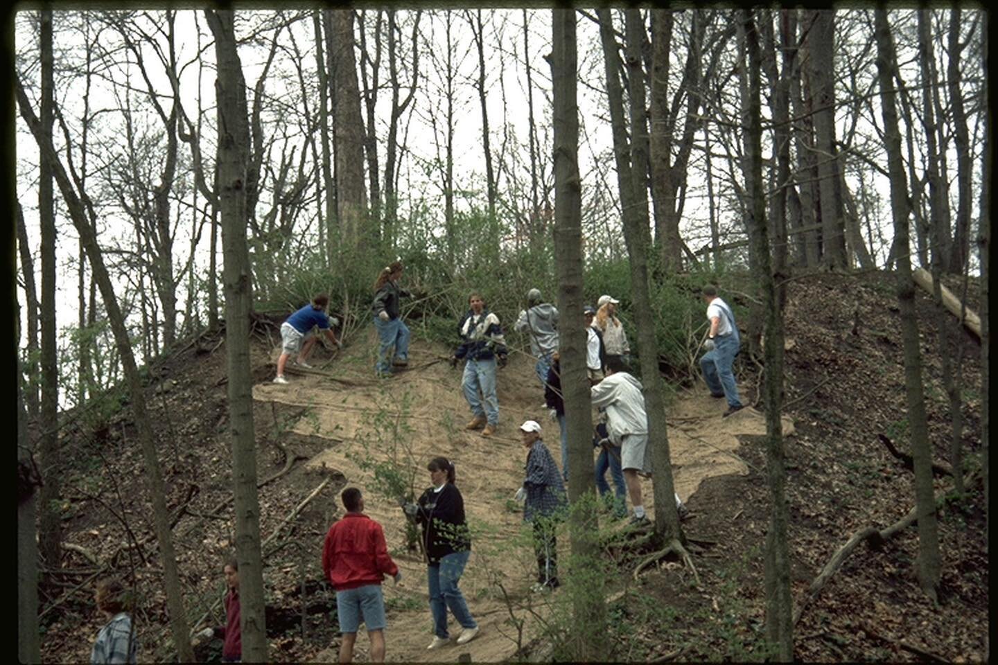 from the archives!

Spring 1997: Students from the Center for Earth and Environmental Sciences at IUPUI work to blanket a hill with jute mat and bush honeysuckle to stabilize the eroding hillslope.

Check out our blog to learn more about Marott&rsquo