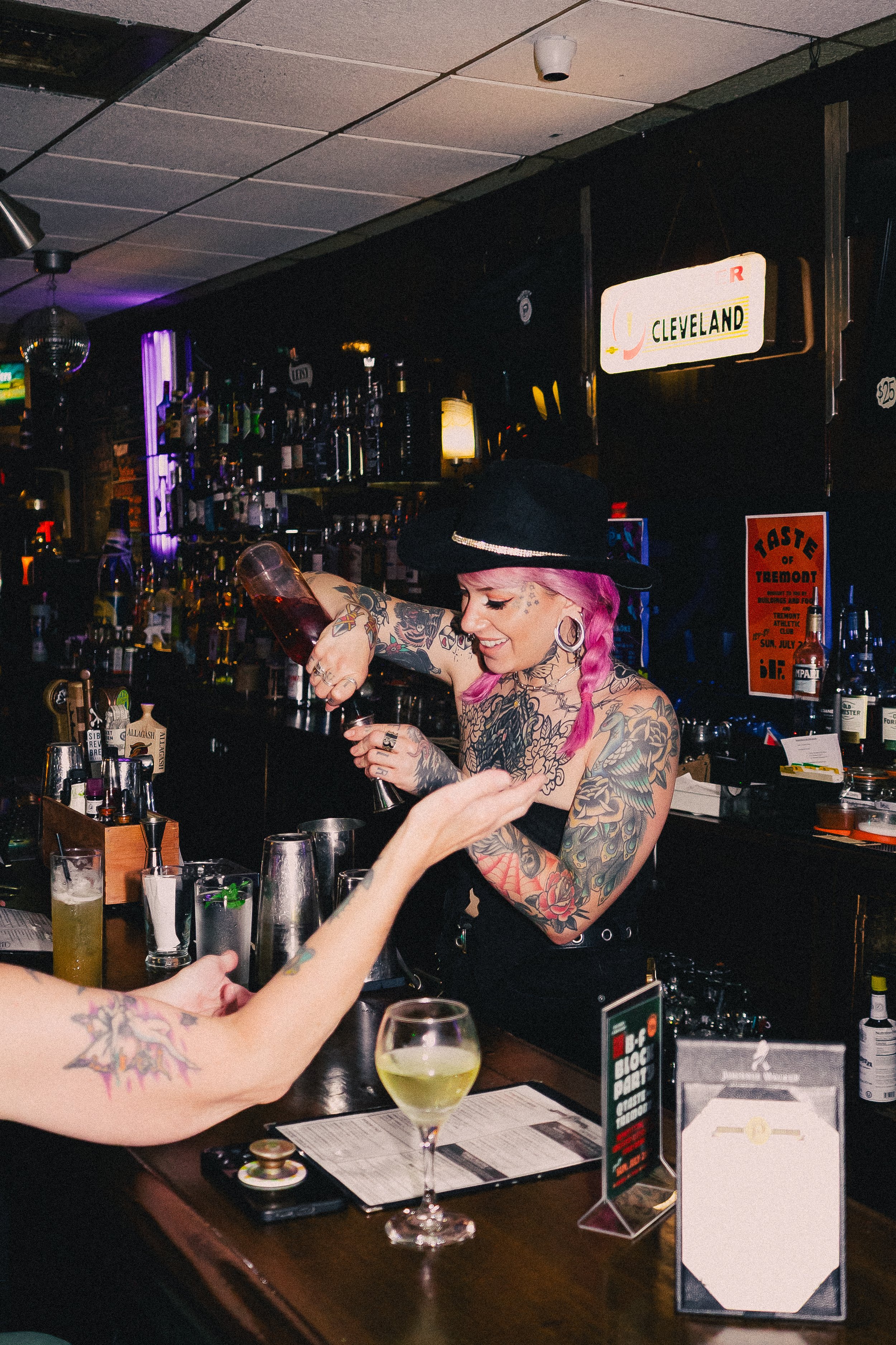 Picture of a Prosperity Social Club cocktail on teh bar