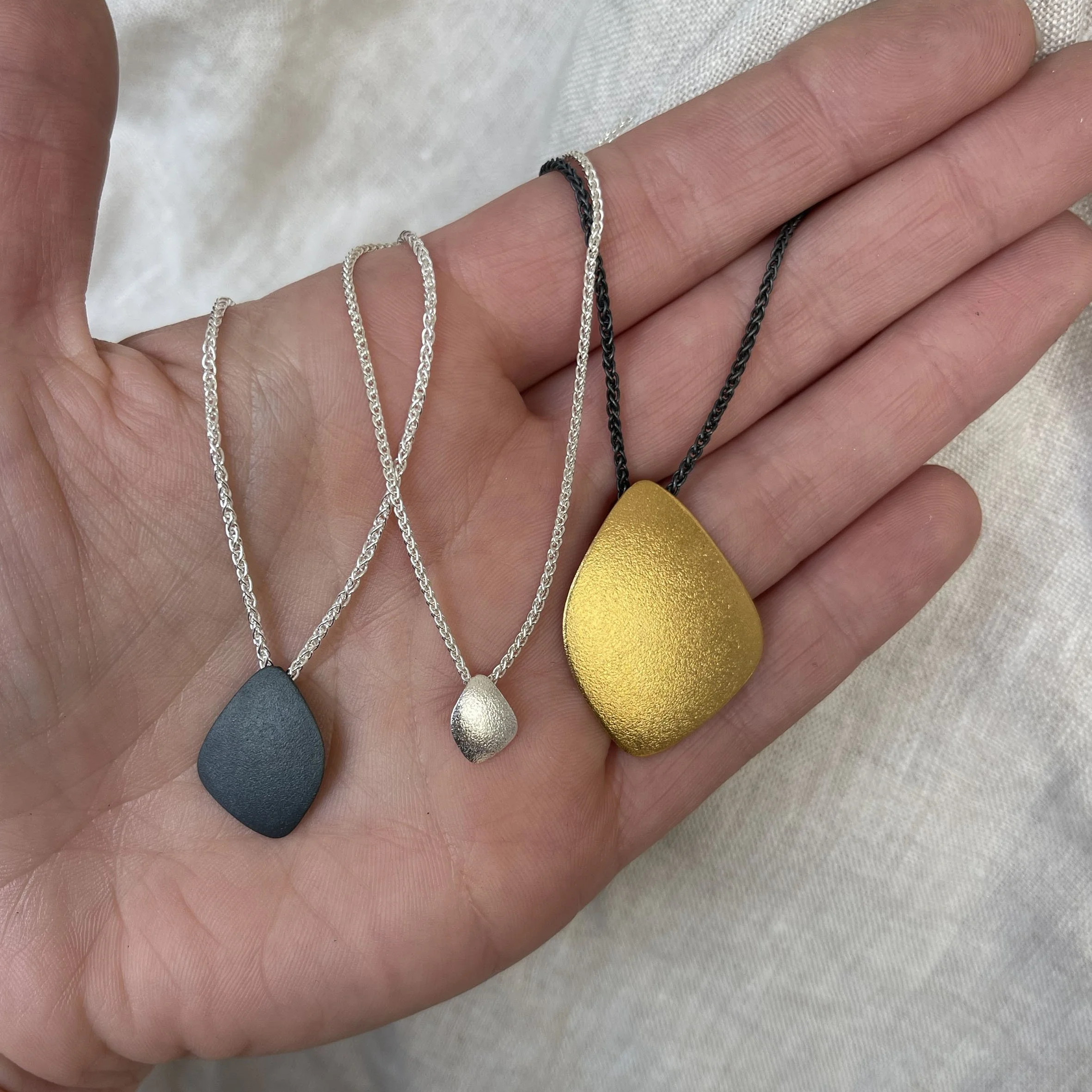 leoma-drew-wing-freeform-spiga-oxidised-gold-pendant-necklace-silver-gold-wing- (5).jpg