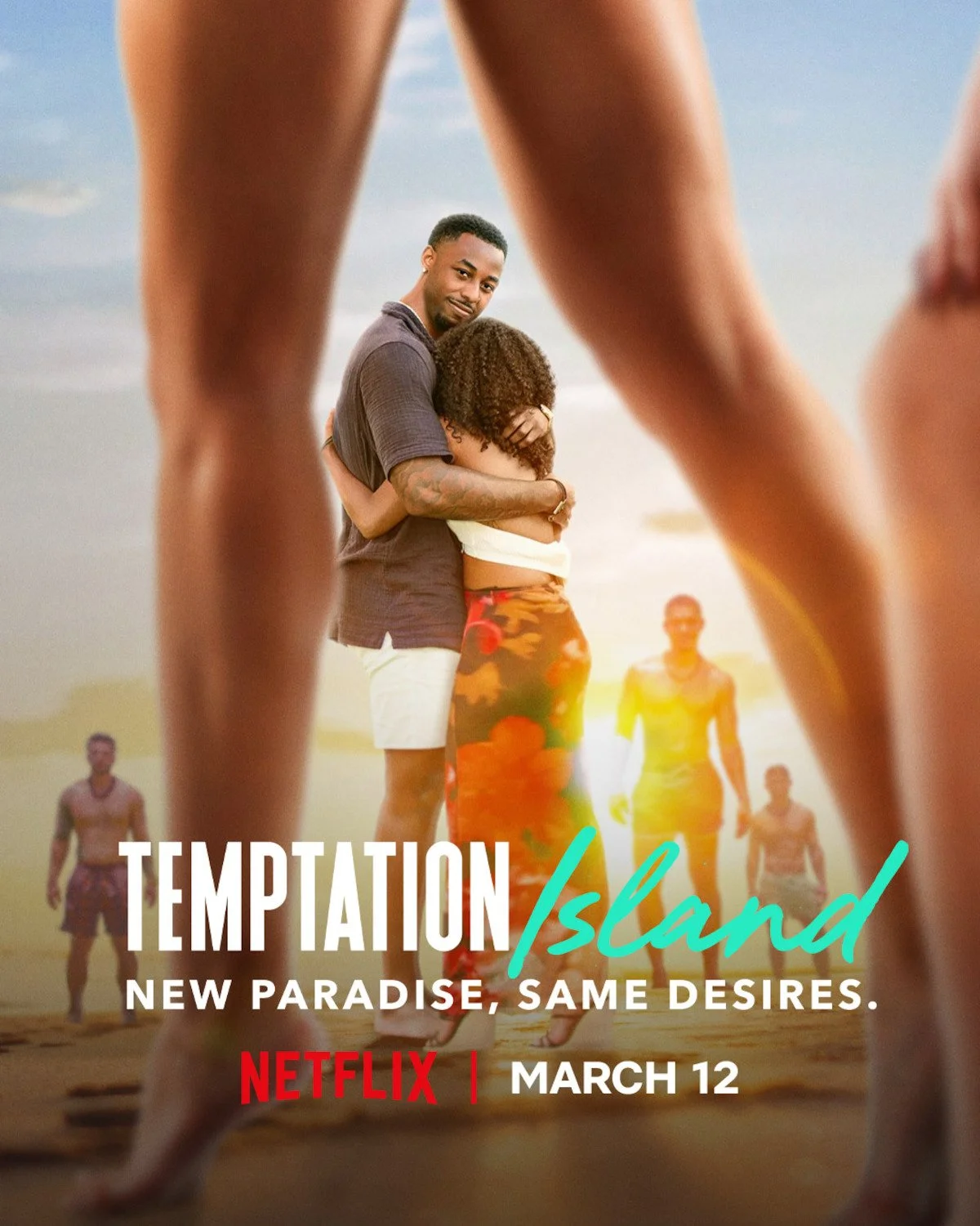 Promotional poster for the Netflix show "Temptation Island" showing a couple hugging on a sandy beach, framed by the legs of two people in the foreground, with additional people walking along the beach in the background, and text indicating the show 