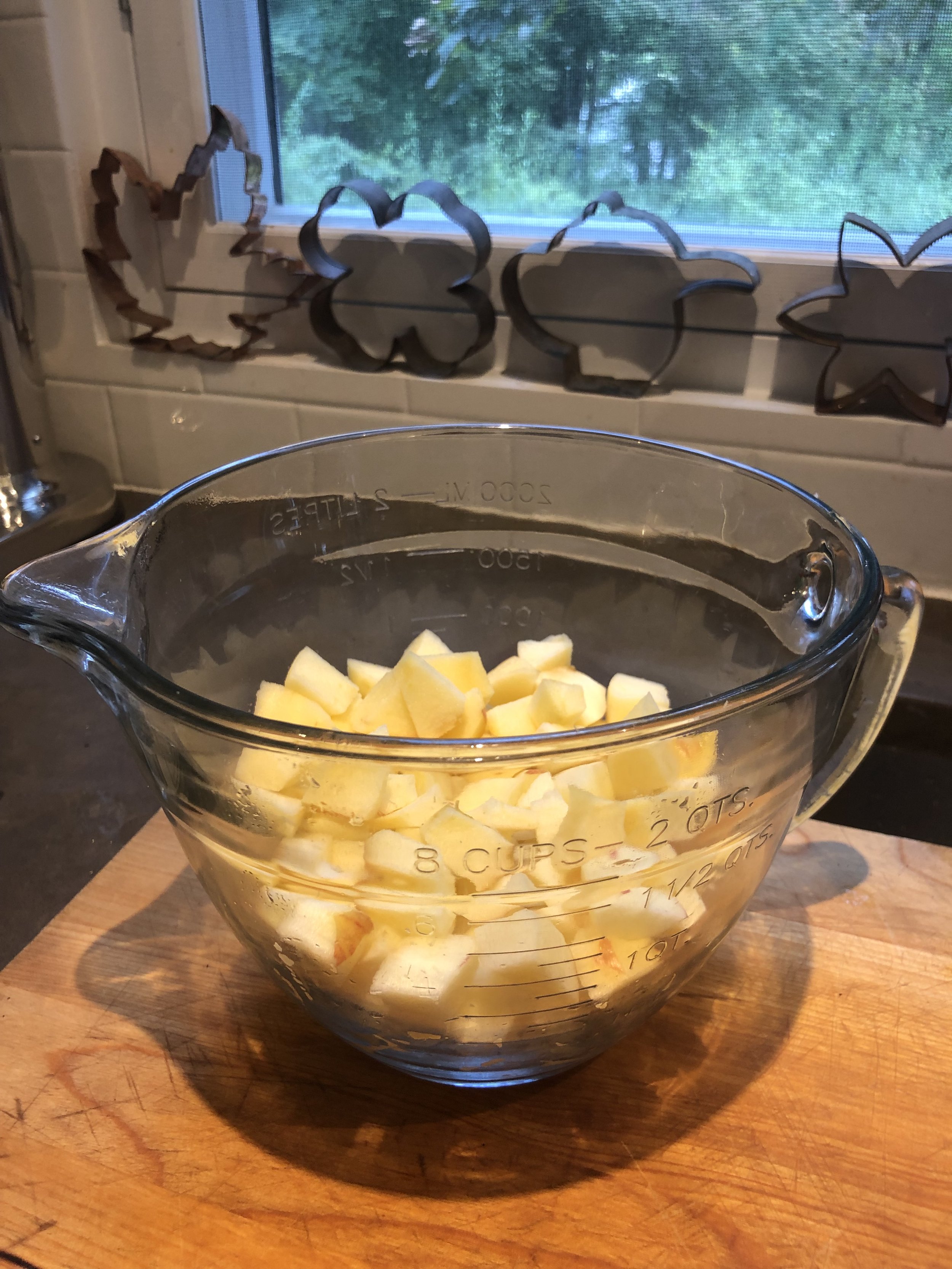 French Apple Cake - bowl of chopped apples.jpeg