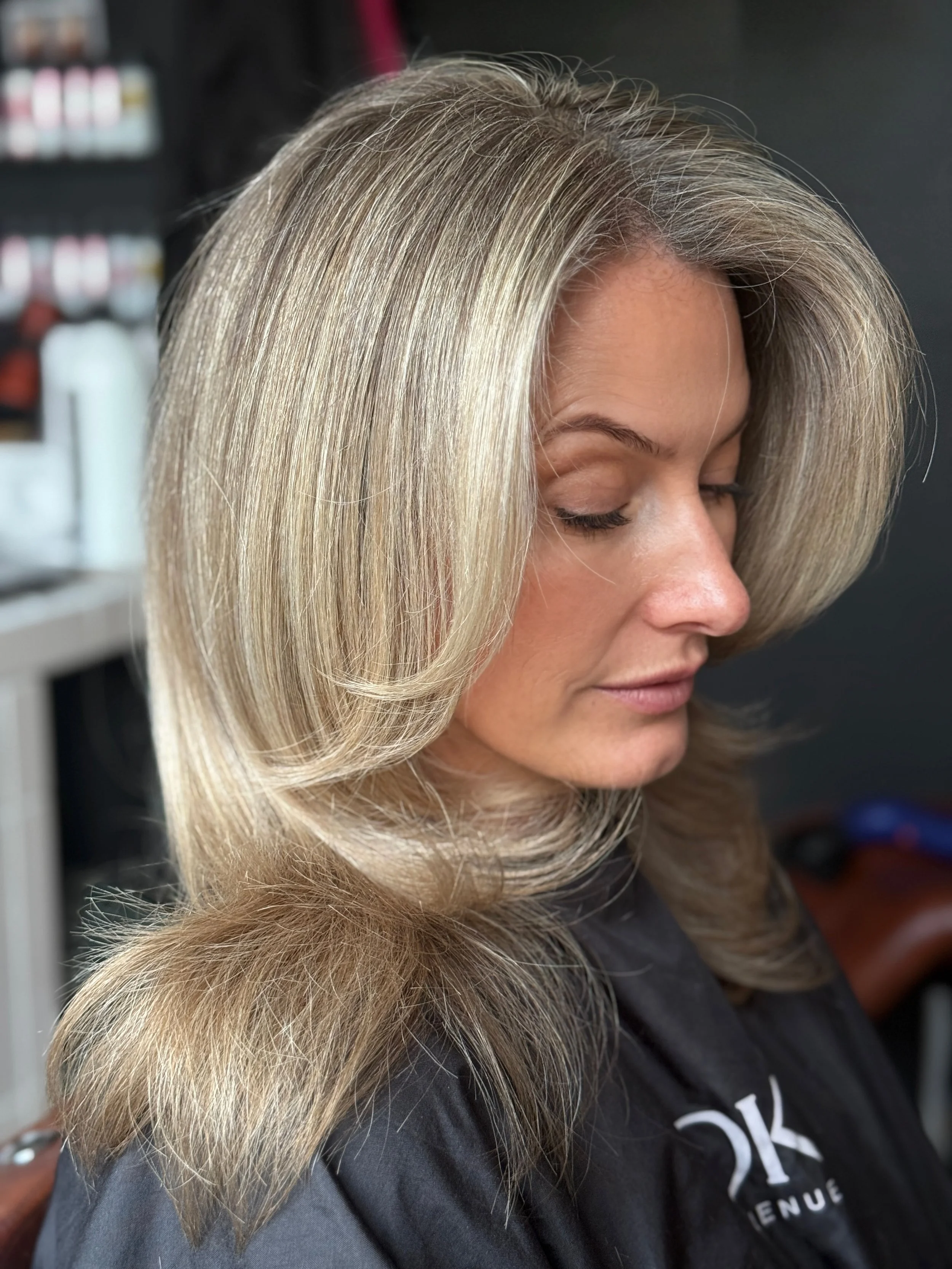 Soft blonde grey blend with layered, voluminous styling by Stephen William Hair, Waterlooville