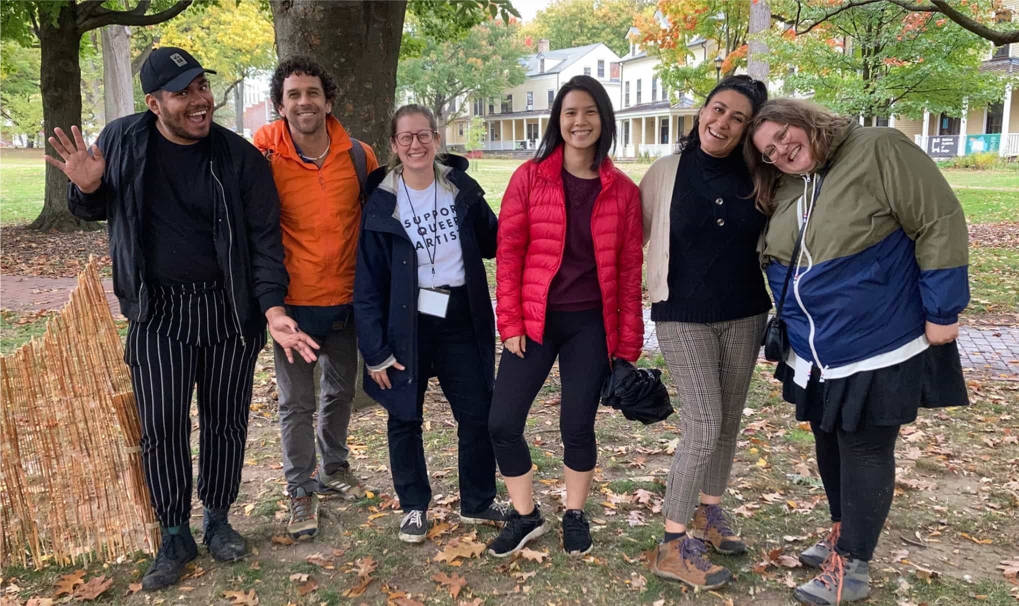 Group of Flying Leap artists in a group photo on governors island