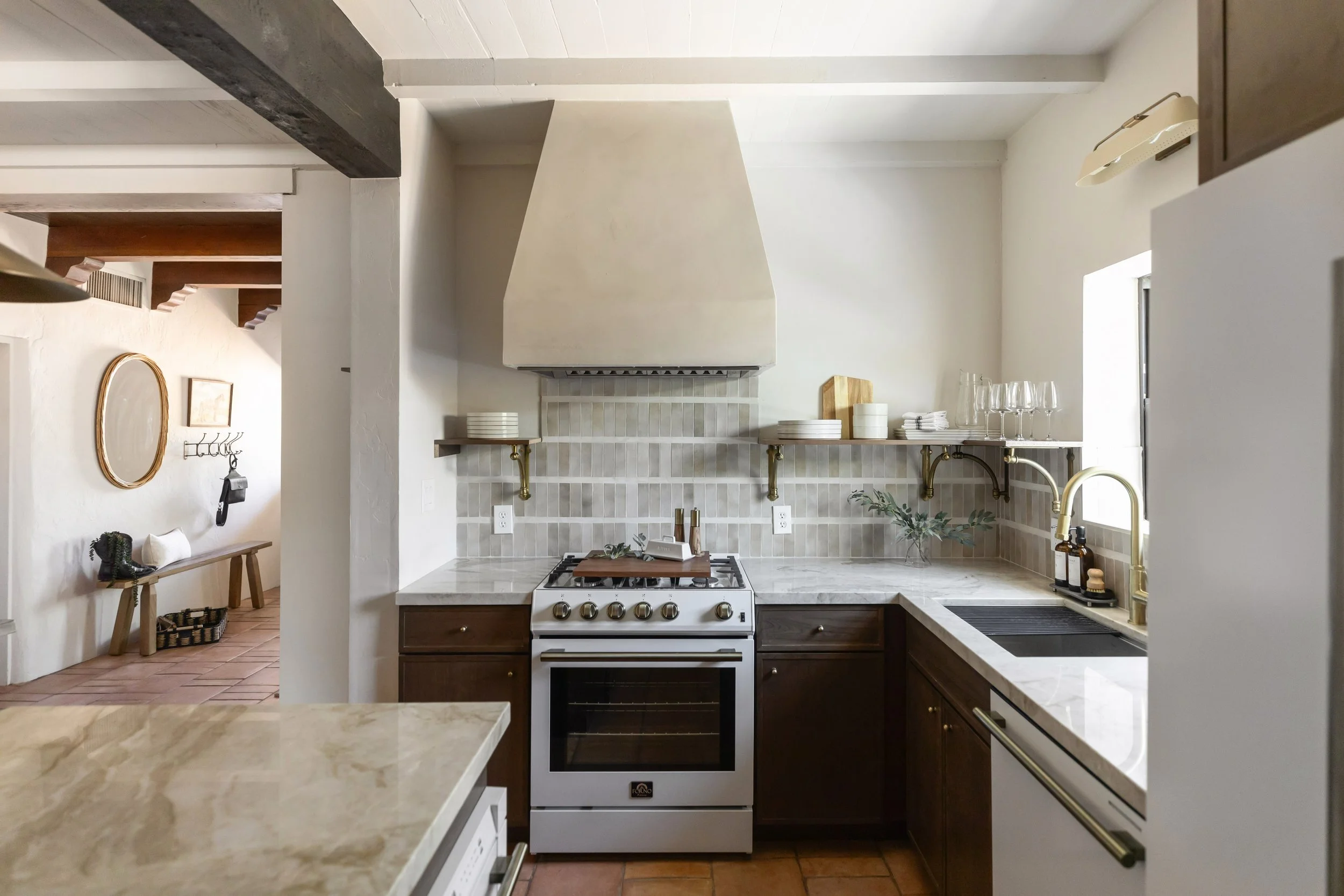 Custom kitchen design inside a historic Tucson pueblo house featuring natural materials, warm neutral tones, and timeless desert modern style.