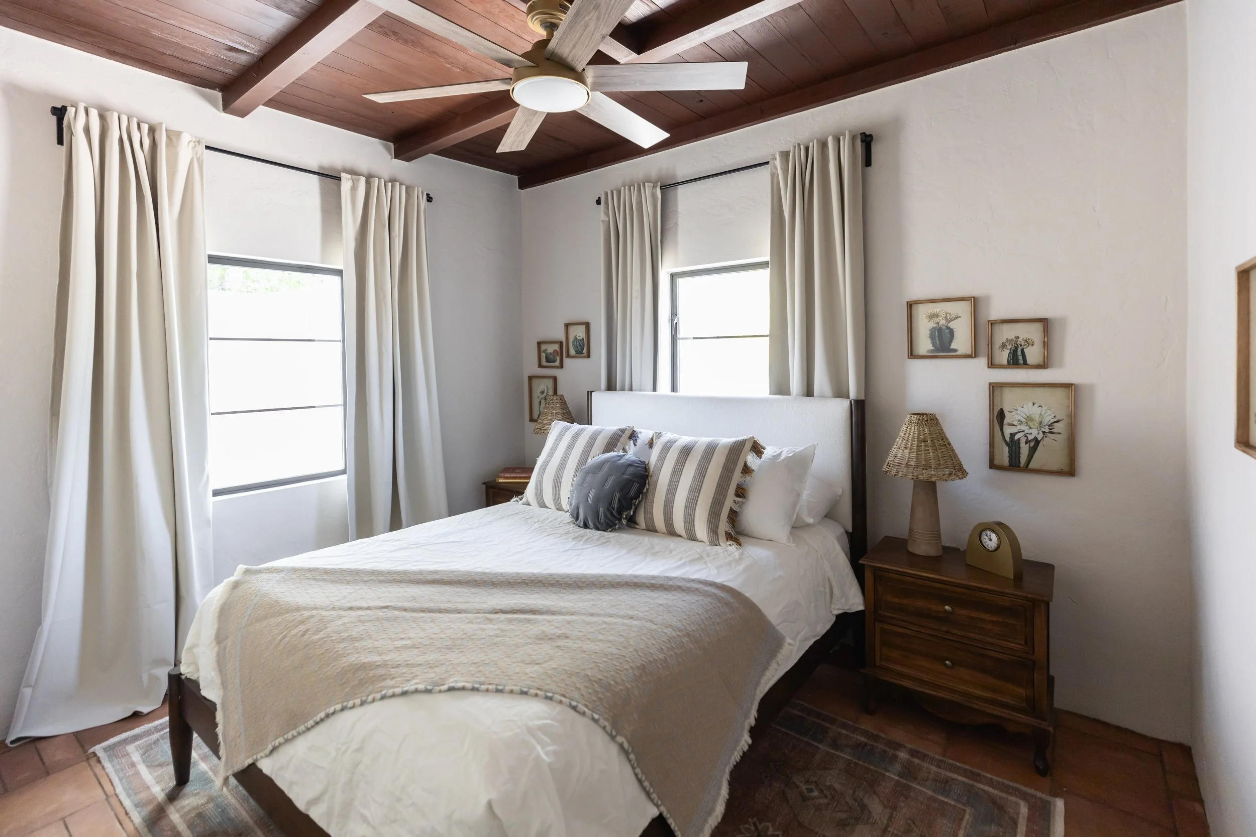Guest bedroom in a renovated 1940s Tucson pueblo home designed with warm desert tones, natural materials, and welcoming modern Southwest style.